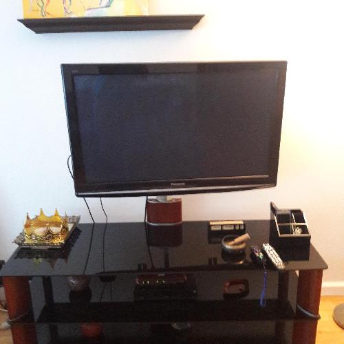 Used Amber & Black TV Stand for sale on AptDeco