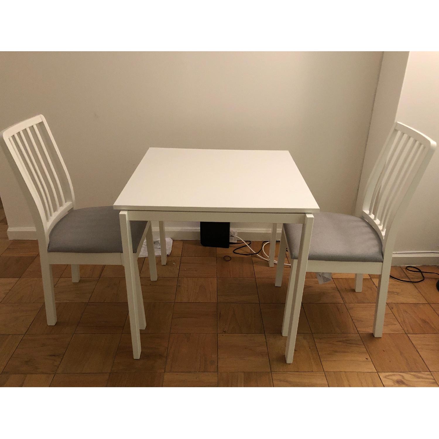 Ikea White Dining Table w/ 2 Upholstered Chairs - image-1