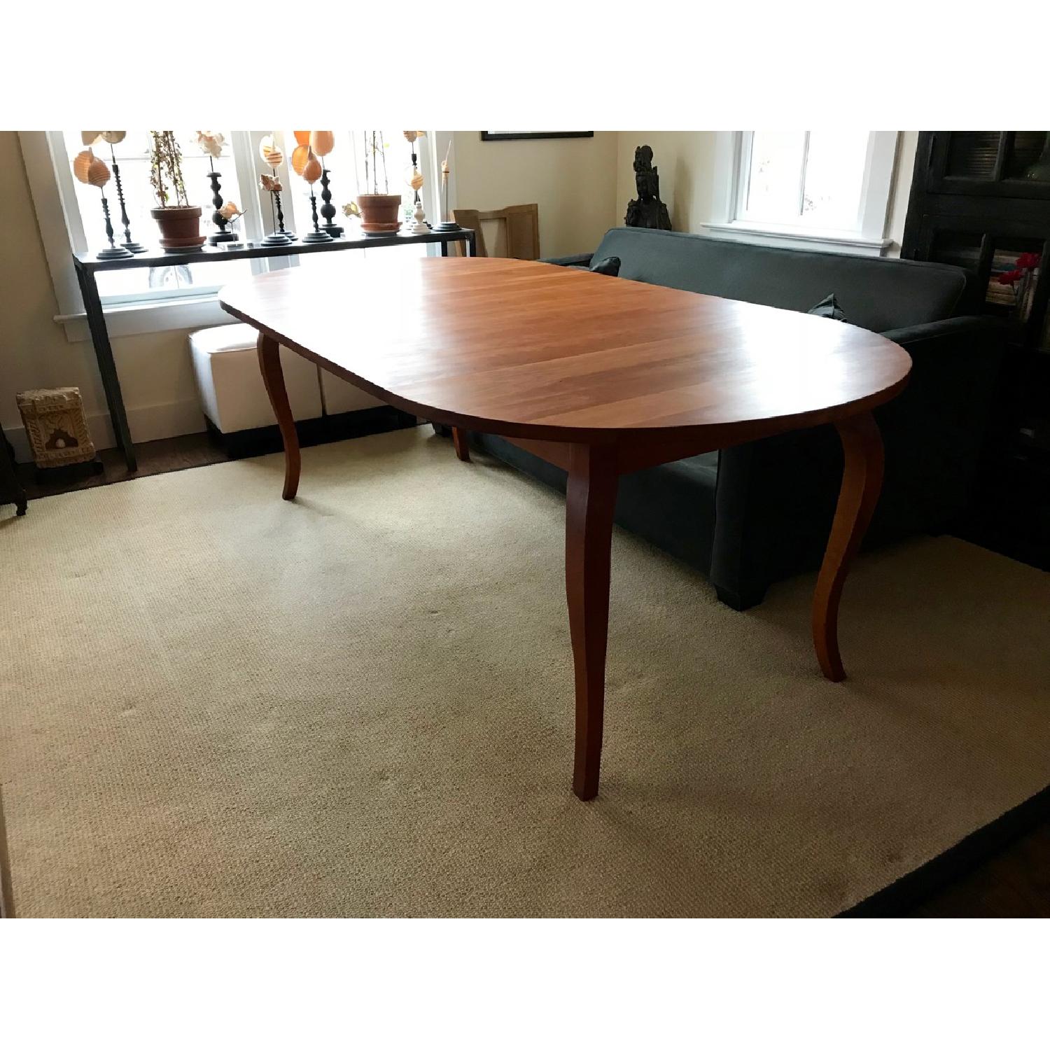 Crate & Barrel Dancer Round Extension Dining Table AptDeco