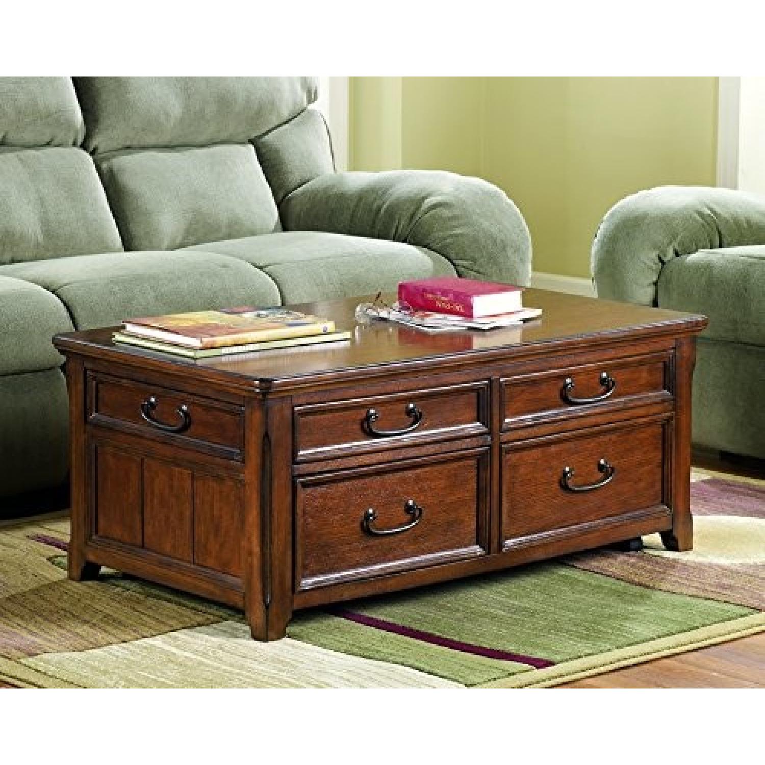 Ashley Woodboro Dark Brown Lift Top Cocktail Table - image-1