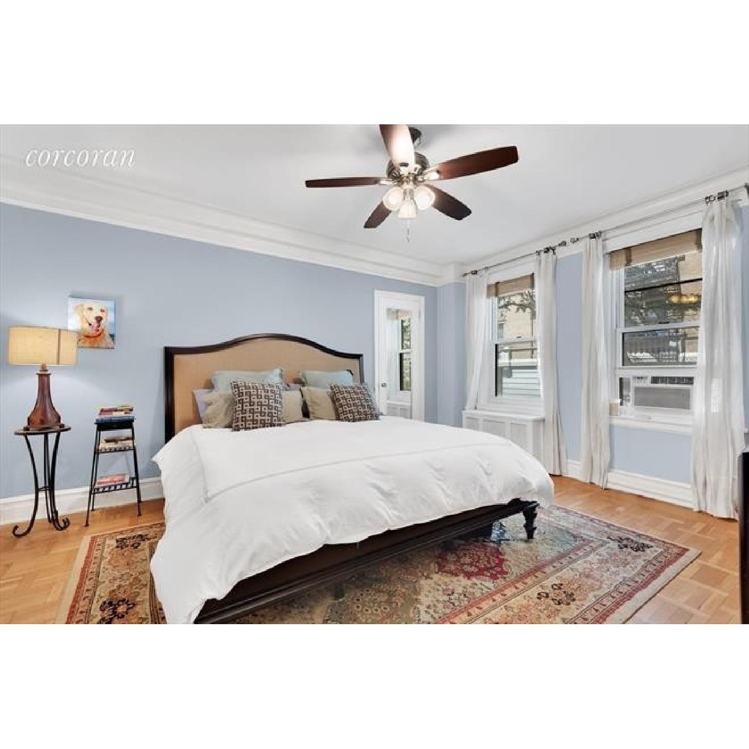 Raymour & Flanigan King Size Wood Bed w/ Cushioned Headboard AptDeco