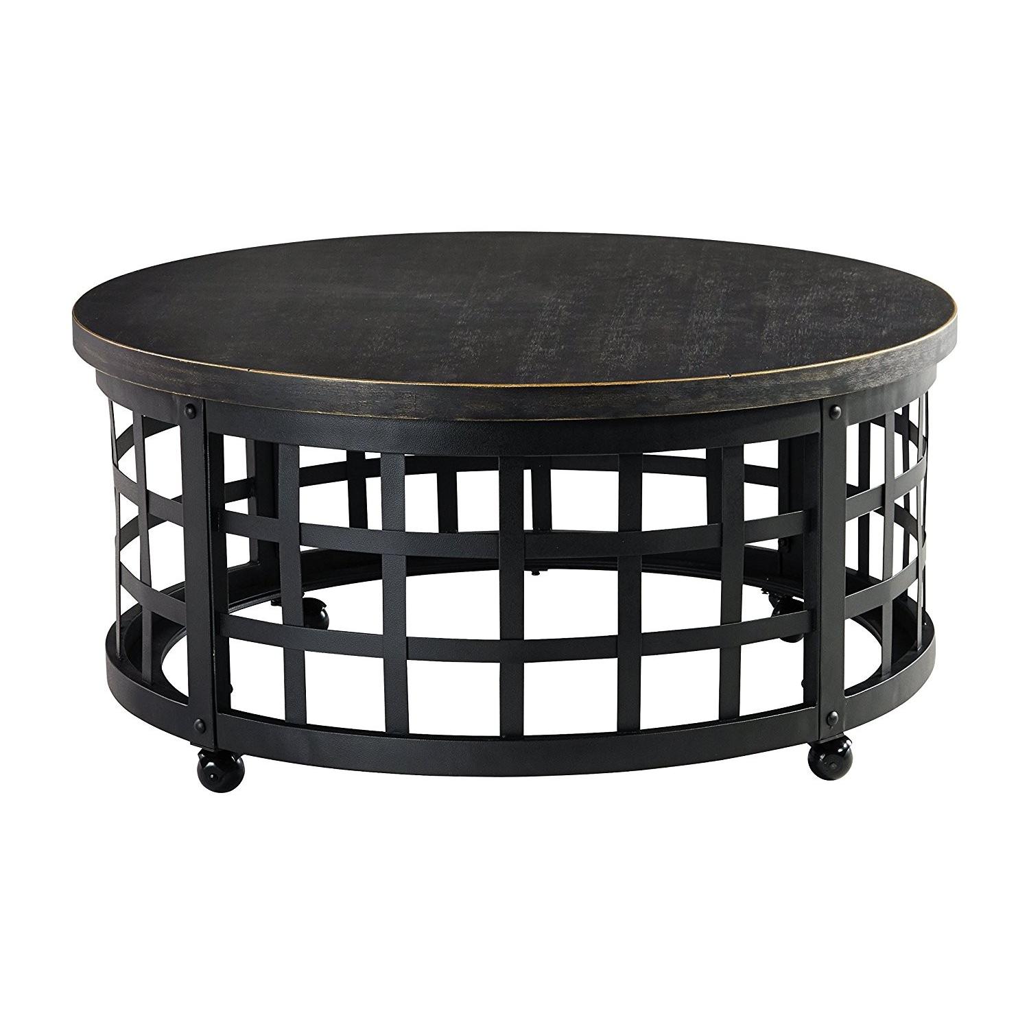 Ashley Furniture Marimon Black Round Cocktail Table - image-0