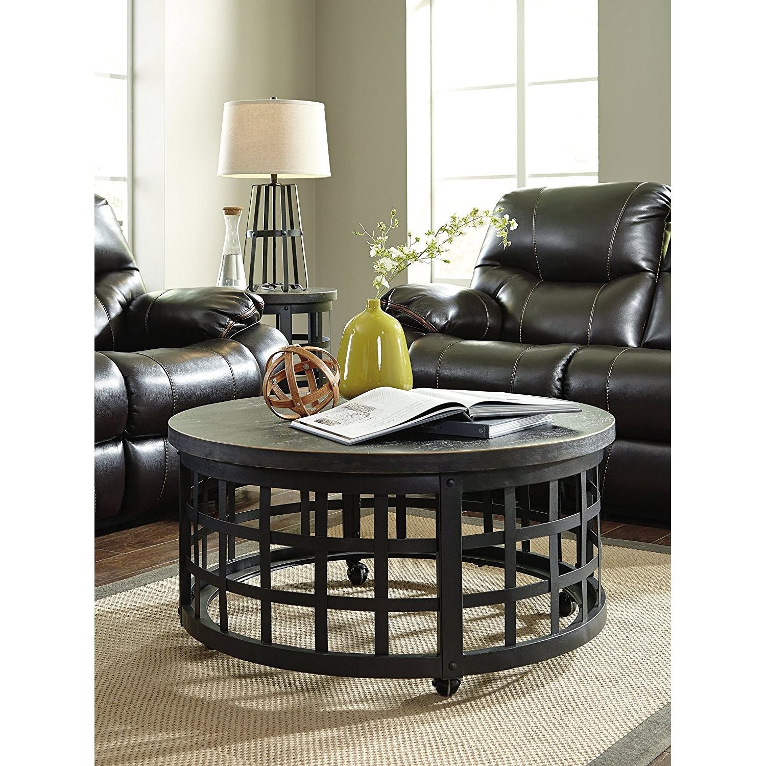 Ashley Furniture Marimon Black Round Cocktail Table - image-1