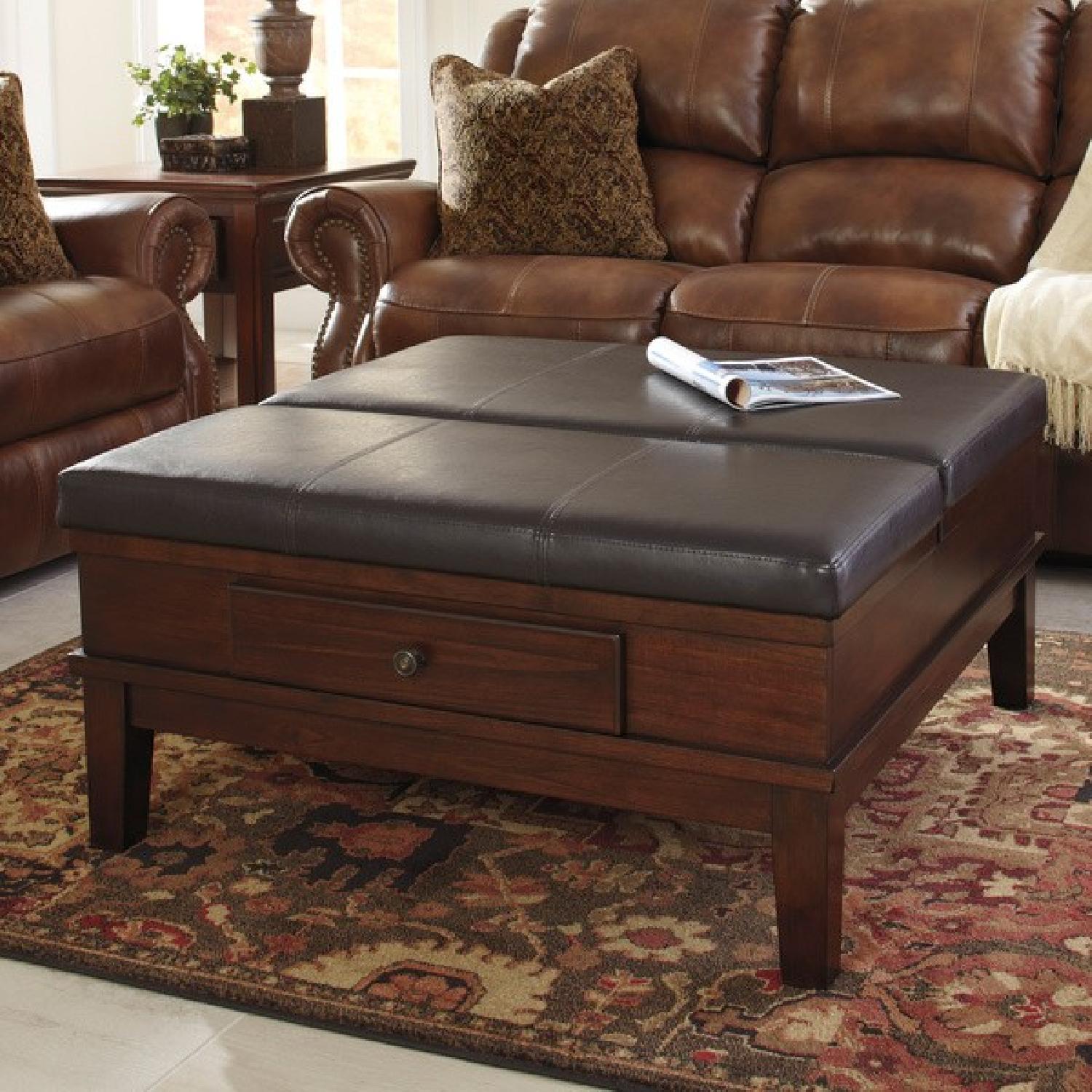 Ashley Furniture Gately Medium Brown Ottoman Cocktail Table - image-1