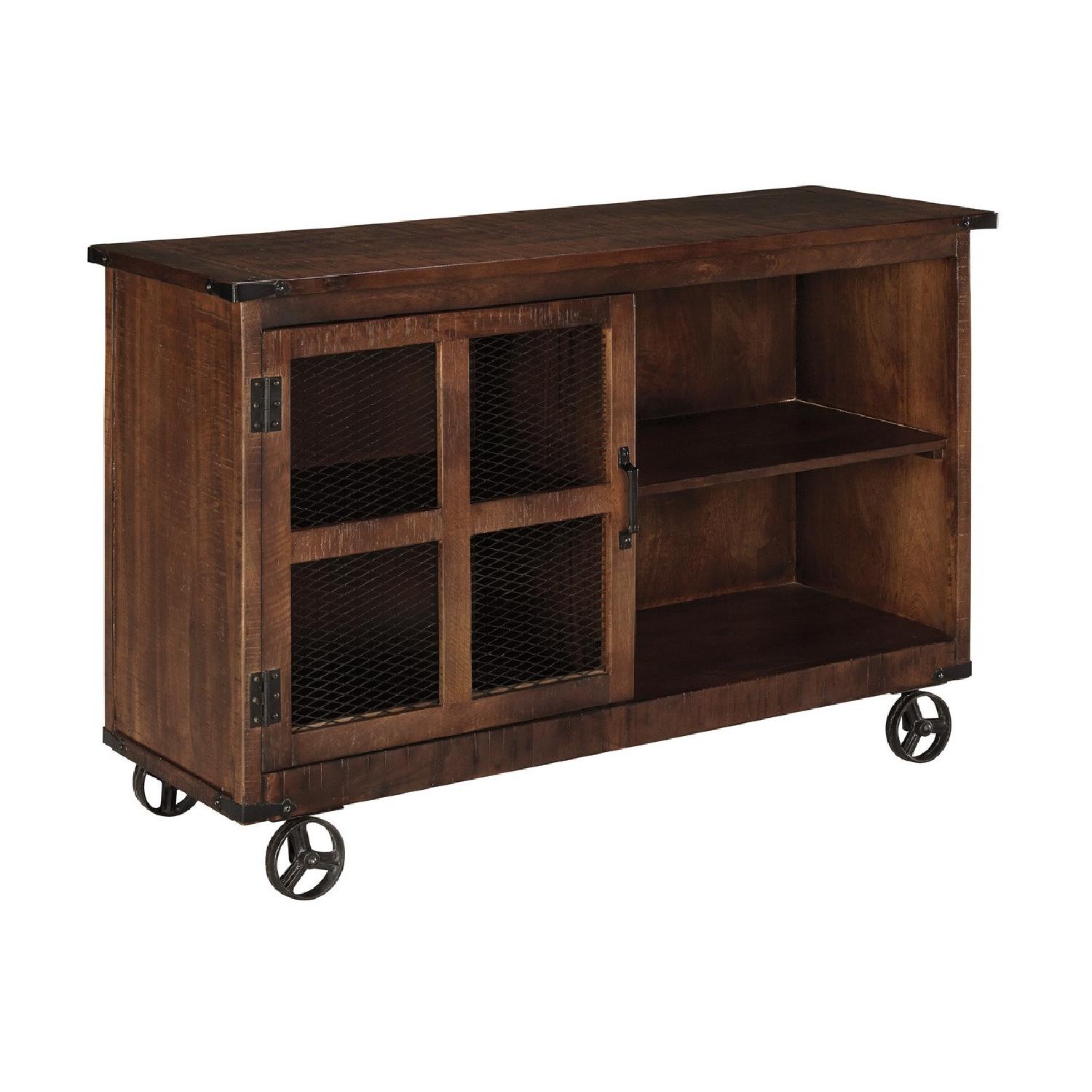 Ashley Furniture Norlandon Medium Brown Console - image-0