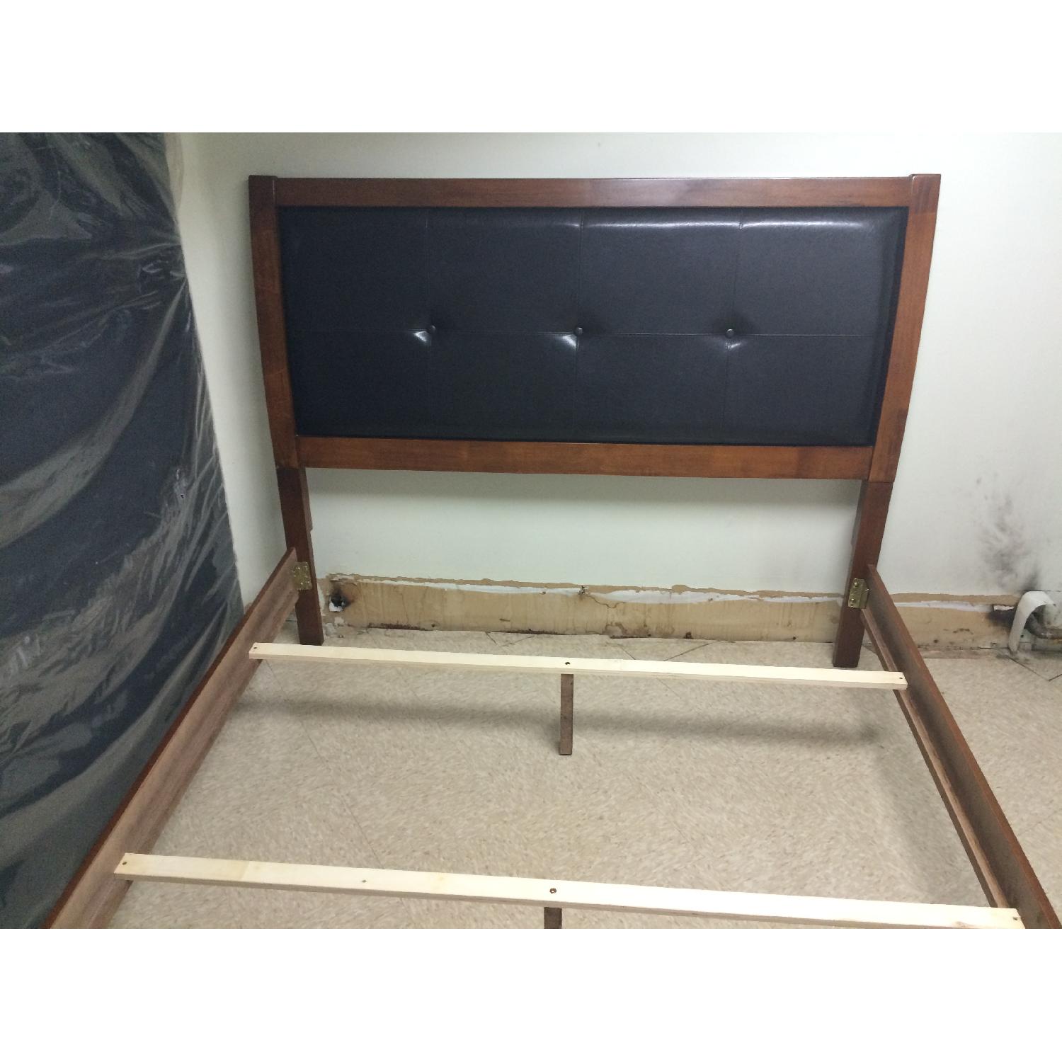 Ashley's Queen Platform Style Wood Bed Frame w/ Faux Leather Headboard - image-1
