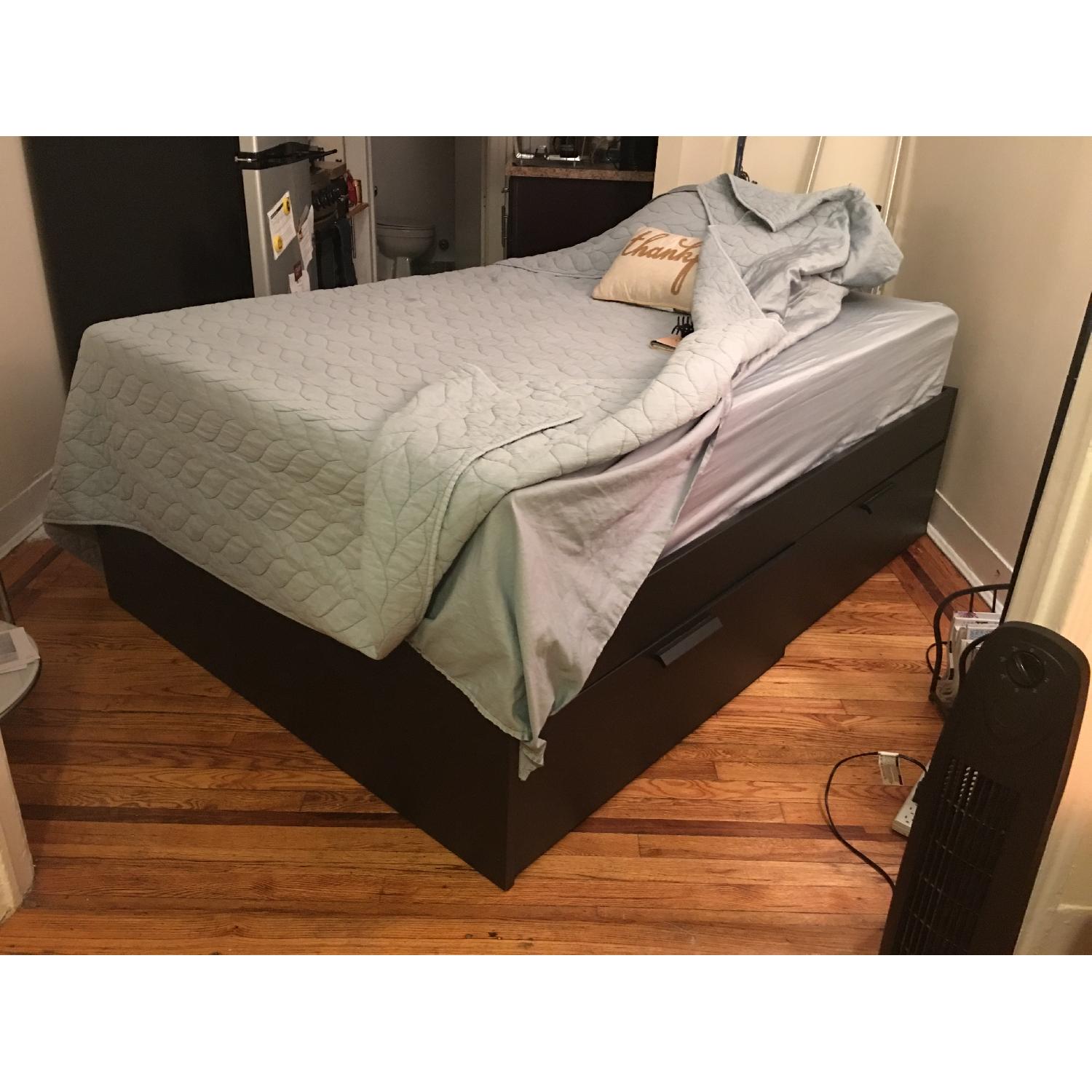 IKea Full Size Bed Frame w/ Four Drawers - image-1