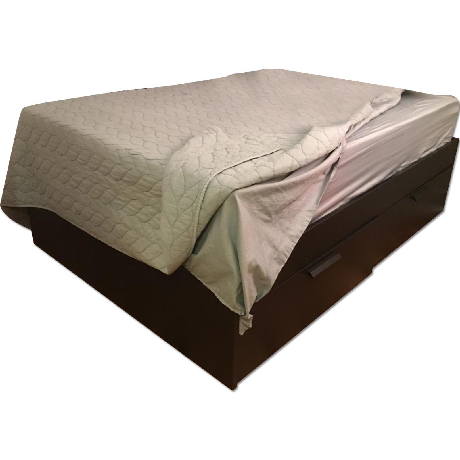 IKea Full Size Bed Frame w/ Four Drawers - image-0