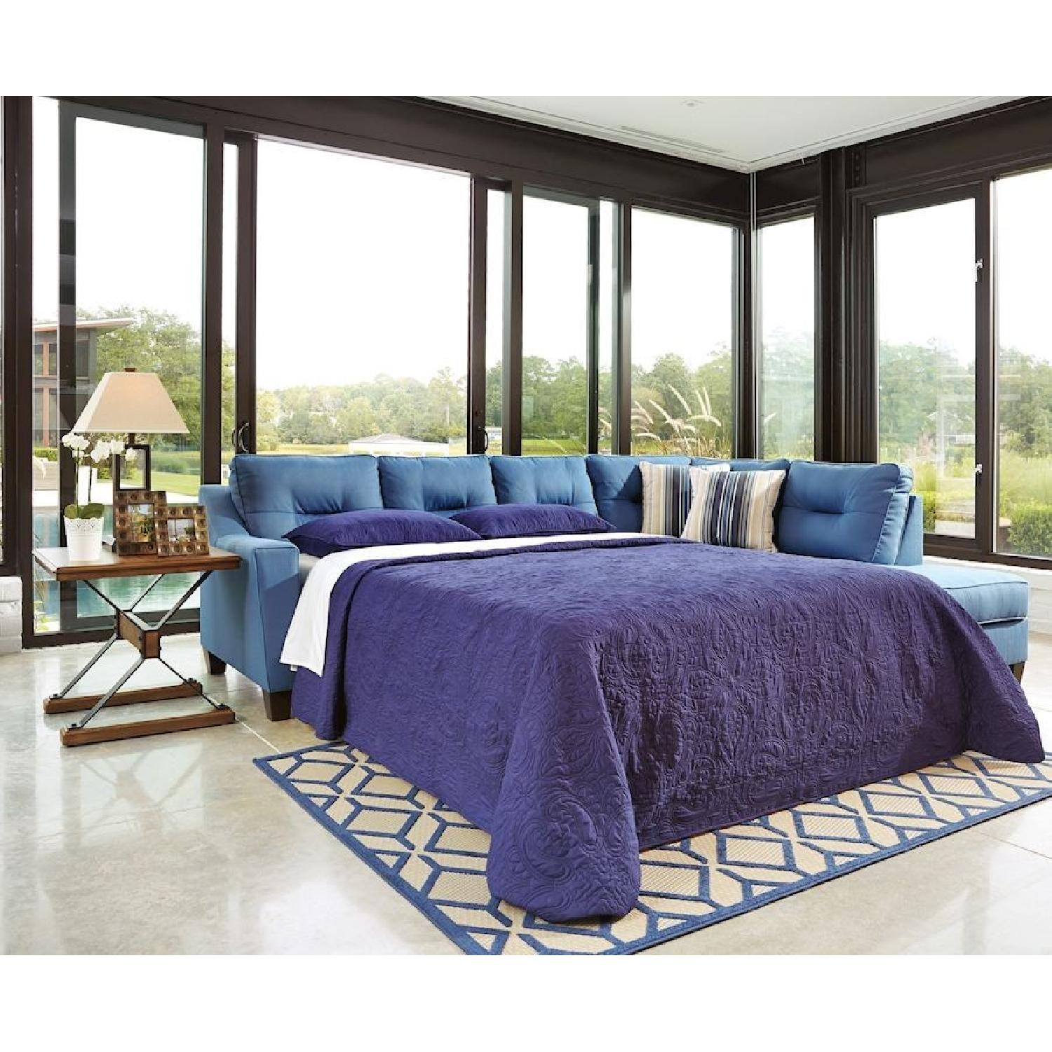 Ashley Furniture Kirwin Nuvella Blue RAF Queen Sofa Sleeper - image-1