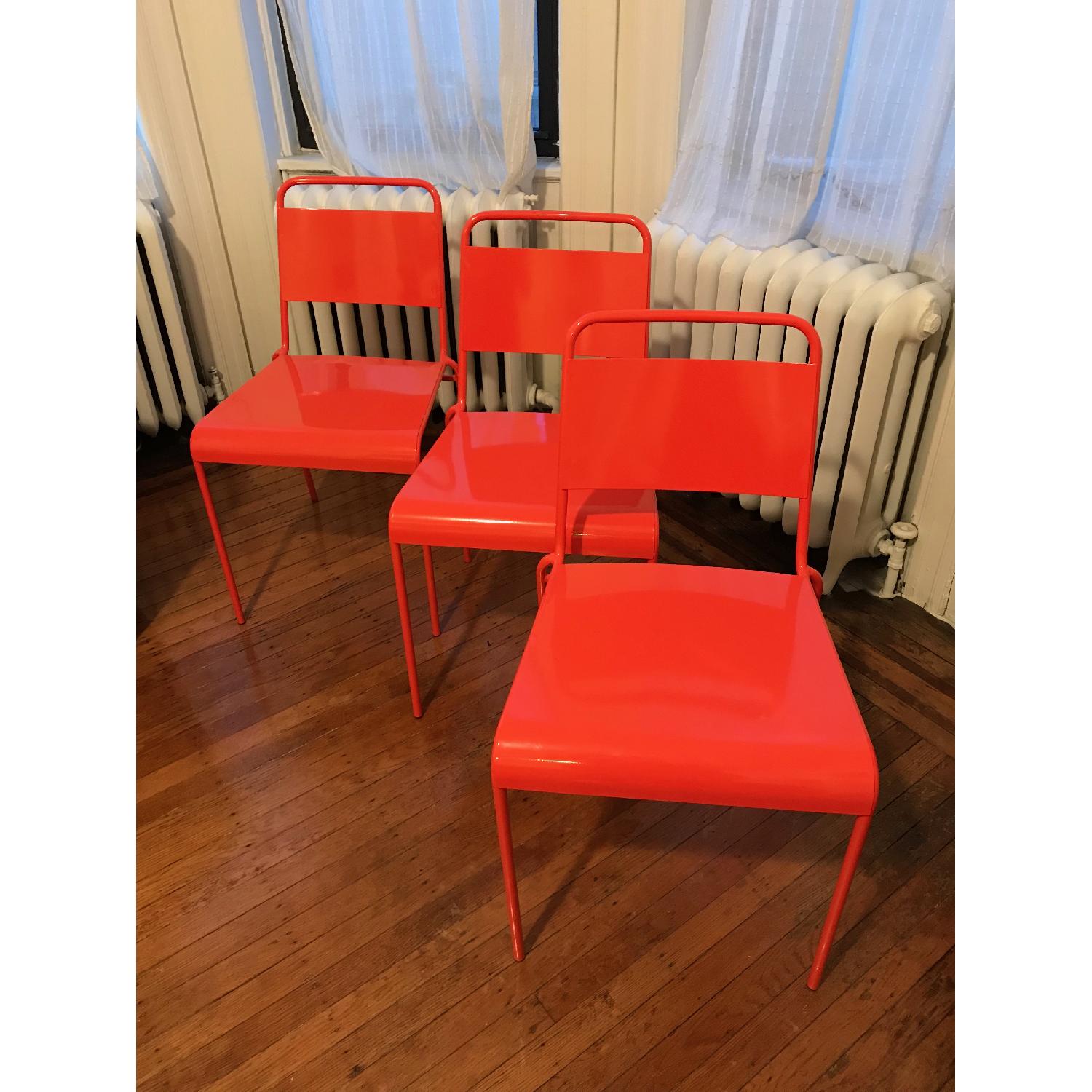 CB2 Lucinda Stacking Orange Dining Chair - image-1