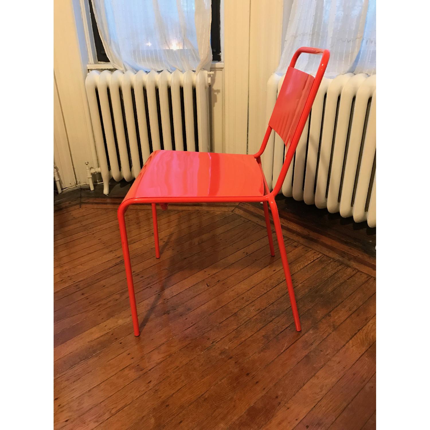 CB2 Lucinda Stacking Orange Dining Chair - image-3