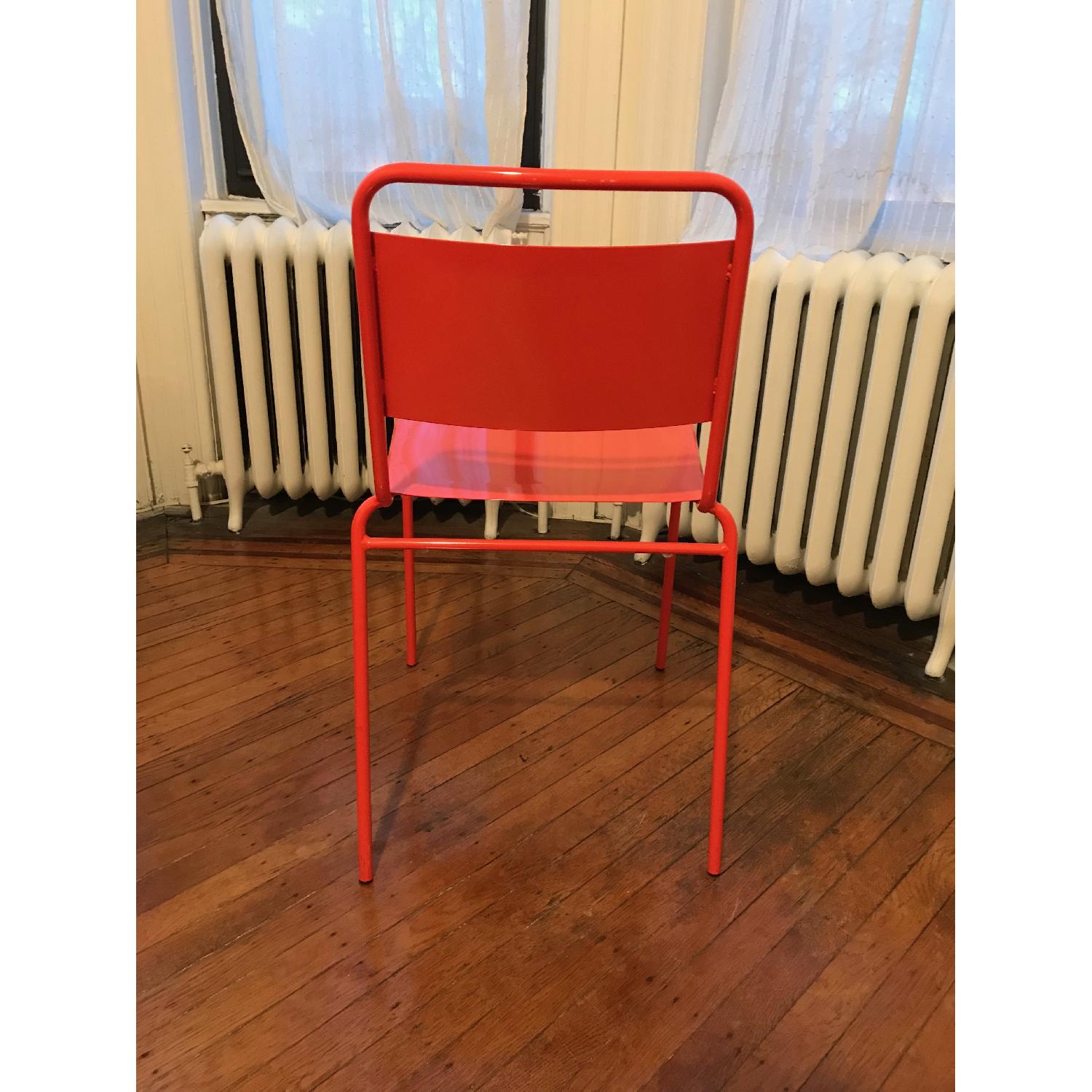 CB2 Lucinda Stacking Orange Dining Chair - image-4