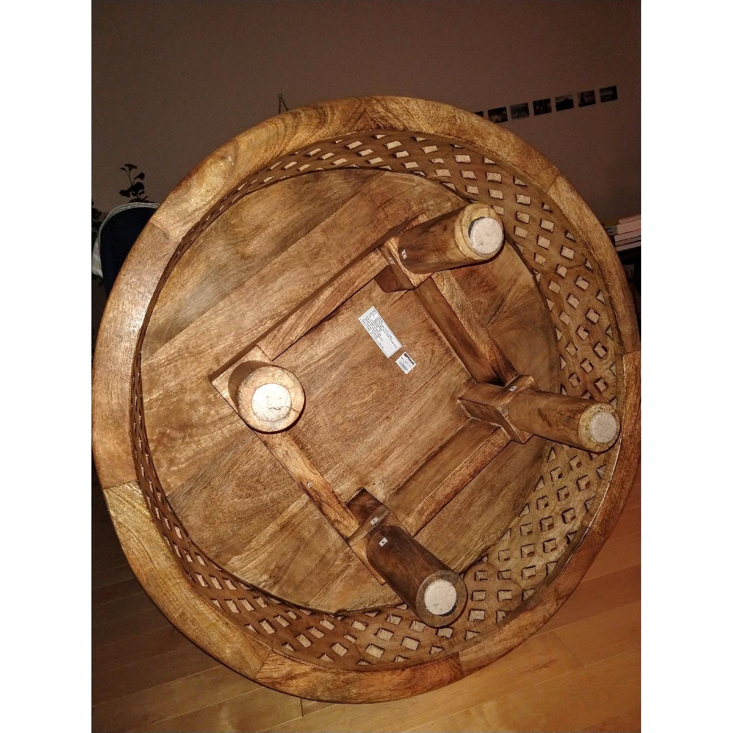 West Elm Hand Carved Solid Mango Wood Coffee Table - AptDeco