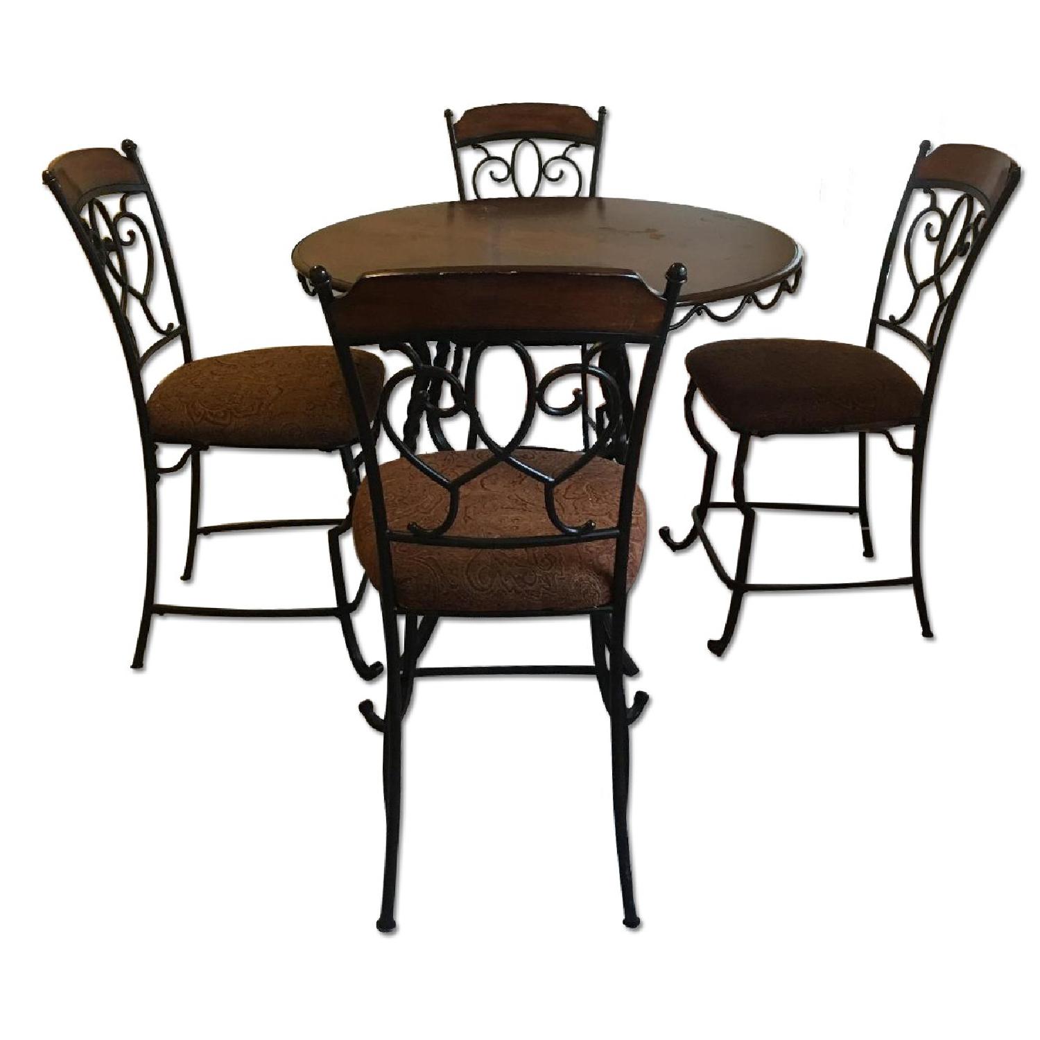 round-black-metal-dining-table-w-4-chairs-aptdeco