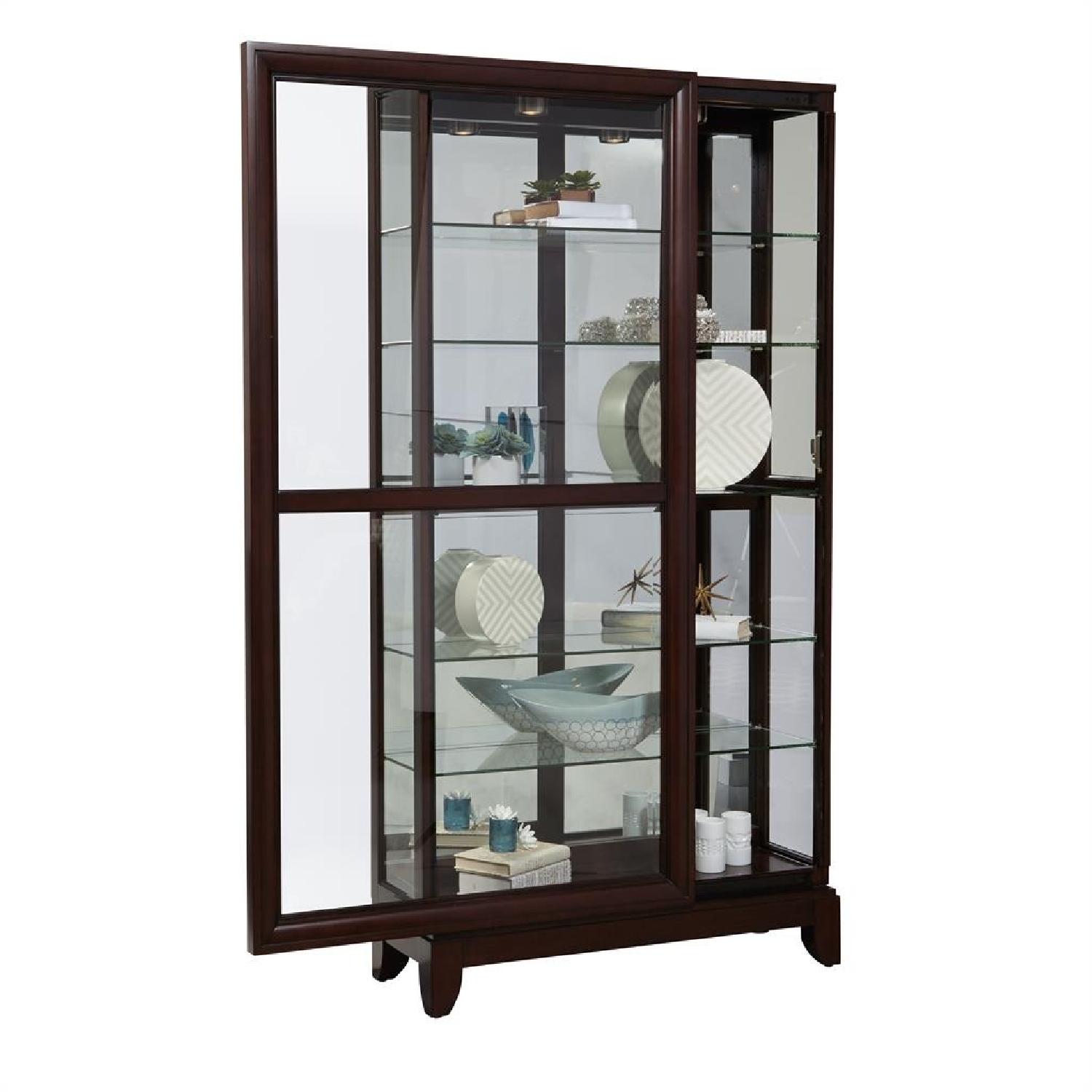 Pulaski Cherry Two Way Sliding Door Curio Cabinet - image-1