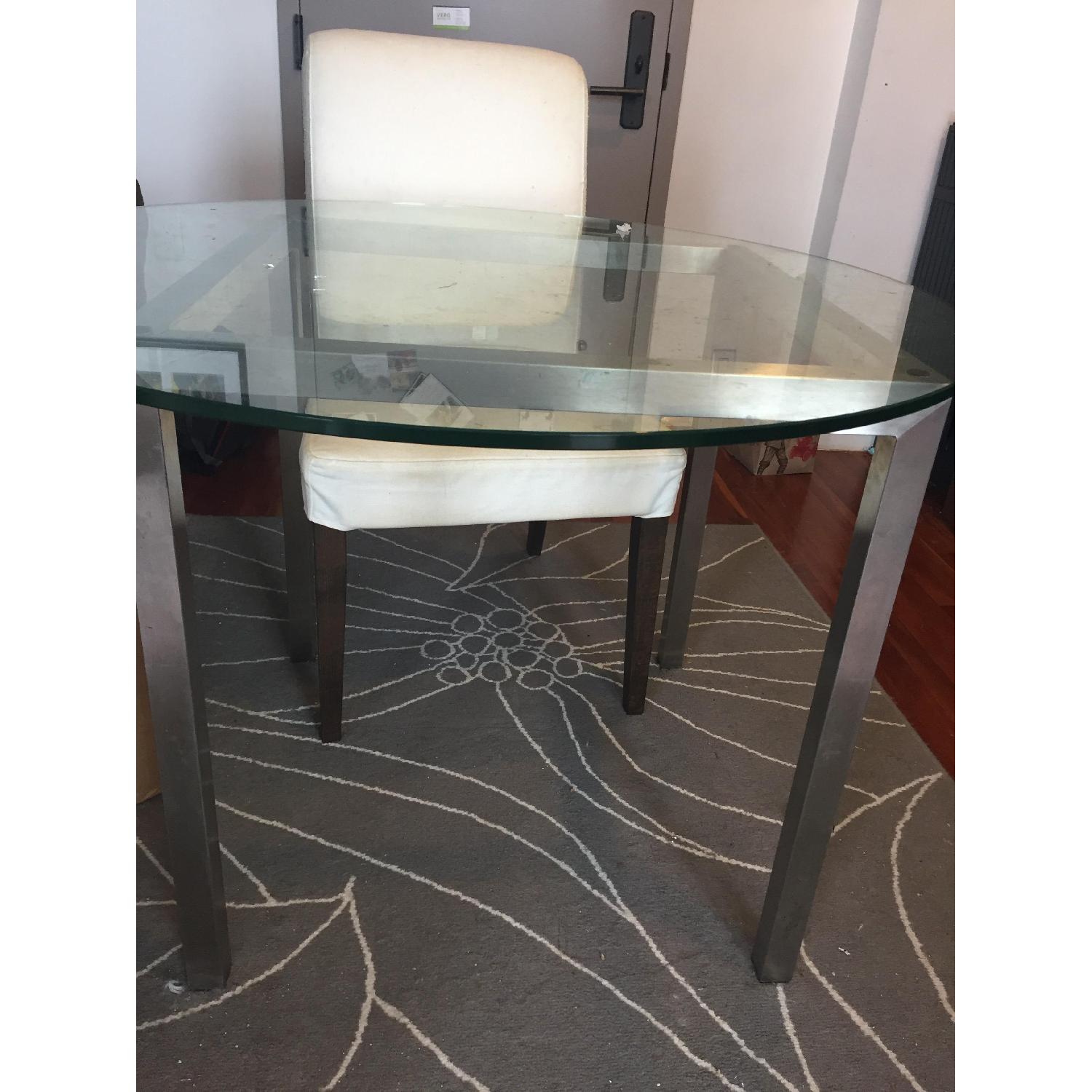 Bloomingdale's Round Glass Dining Table w/ 2 Ikea Chairs AptDeco