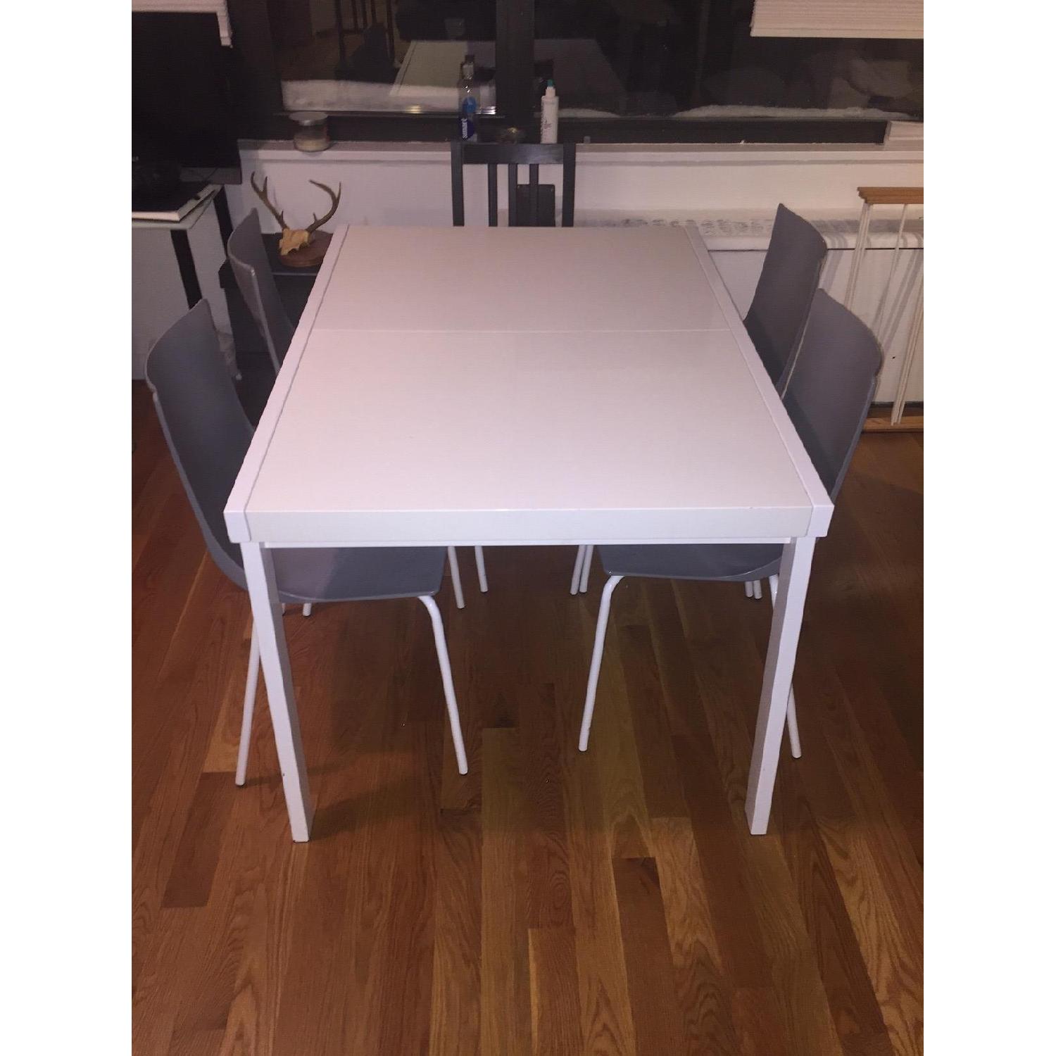 CB2 White Extendable Dining Table AptDeco