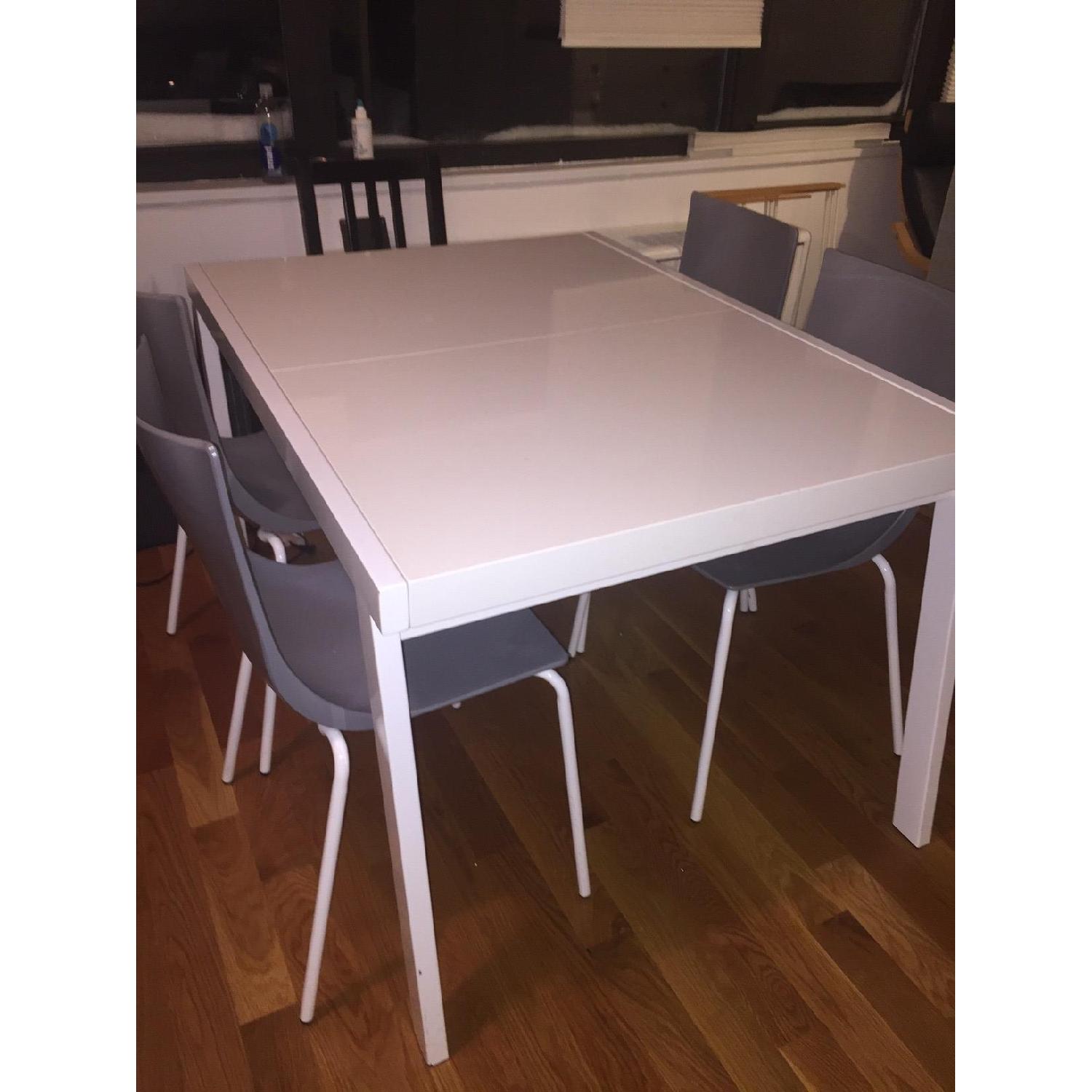 CB2 White Extendable Dining Table AptDeco