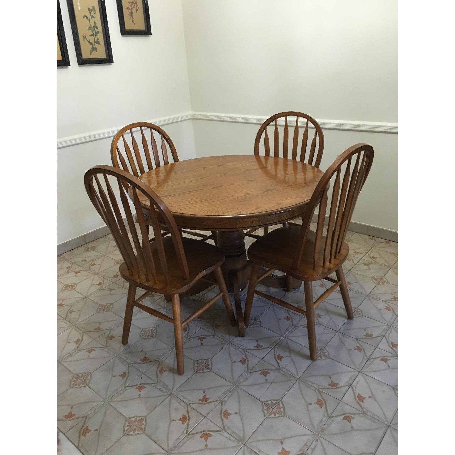 Wood Round Dining Table w/ 4 Chairs - AptDeco