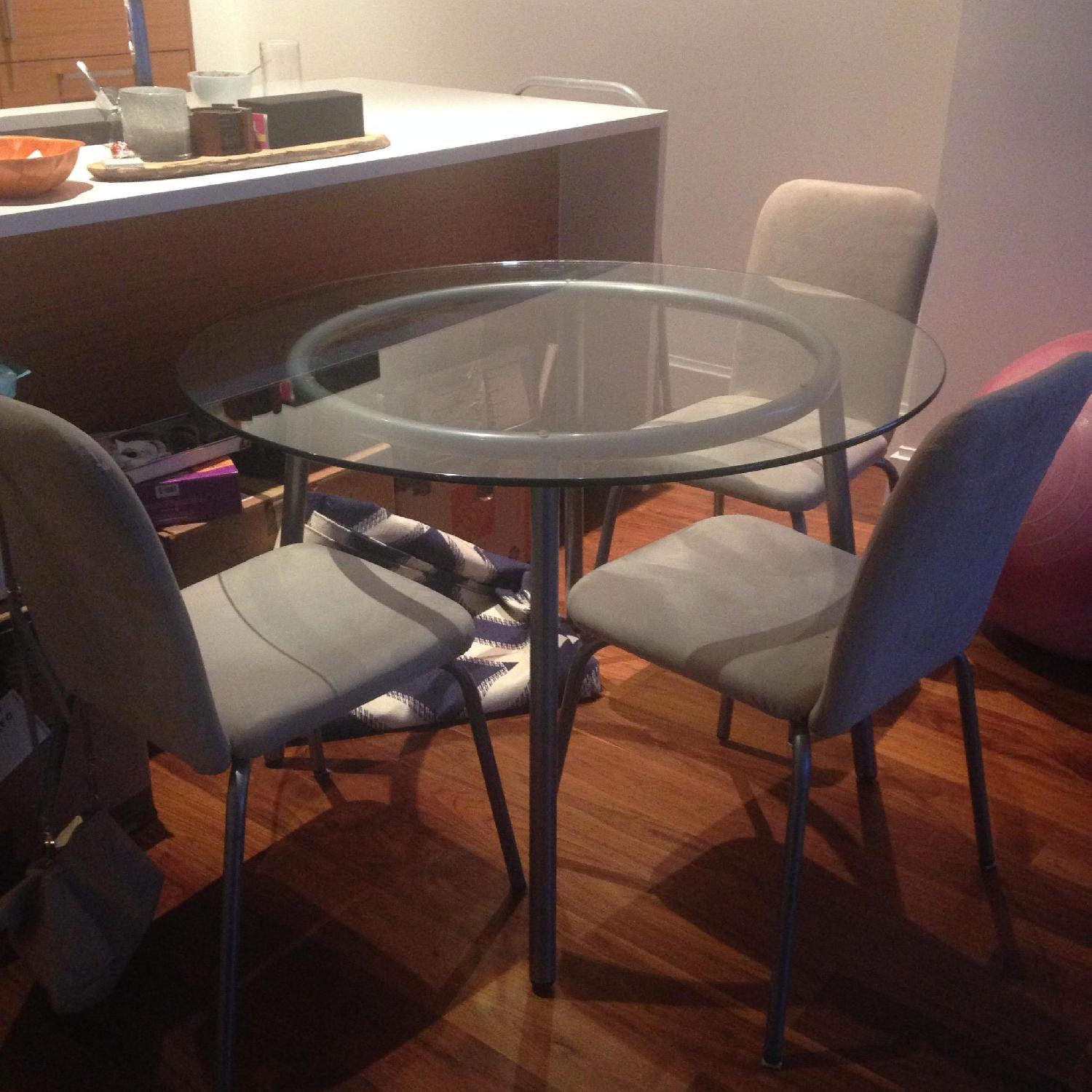 Ikea GlassTop/Metal Legs Dining Table w/ 3 Chairs AptDeco