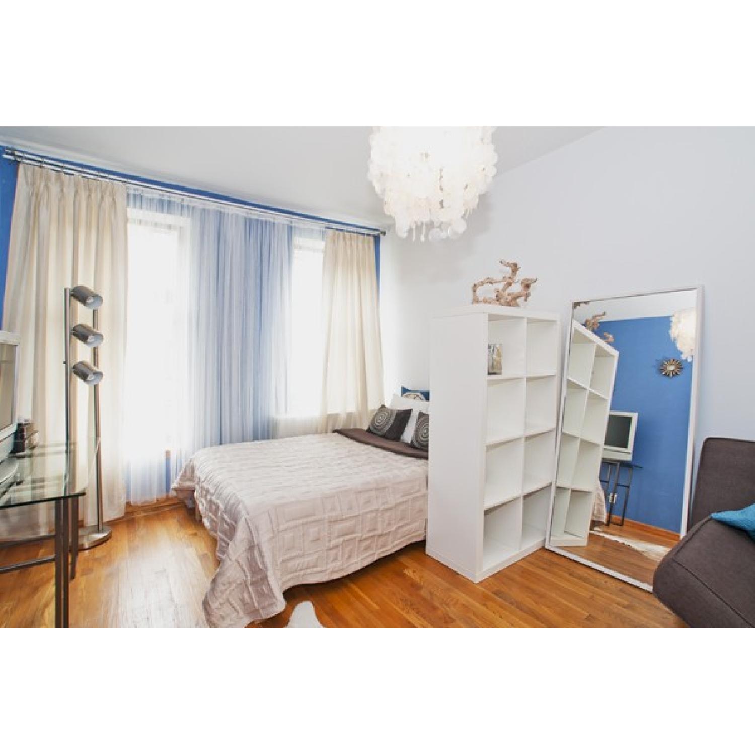 Bookcase w/ Adjustable Shelves in White - image-1