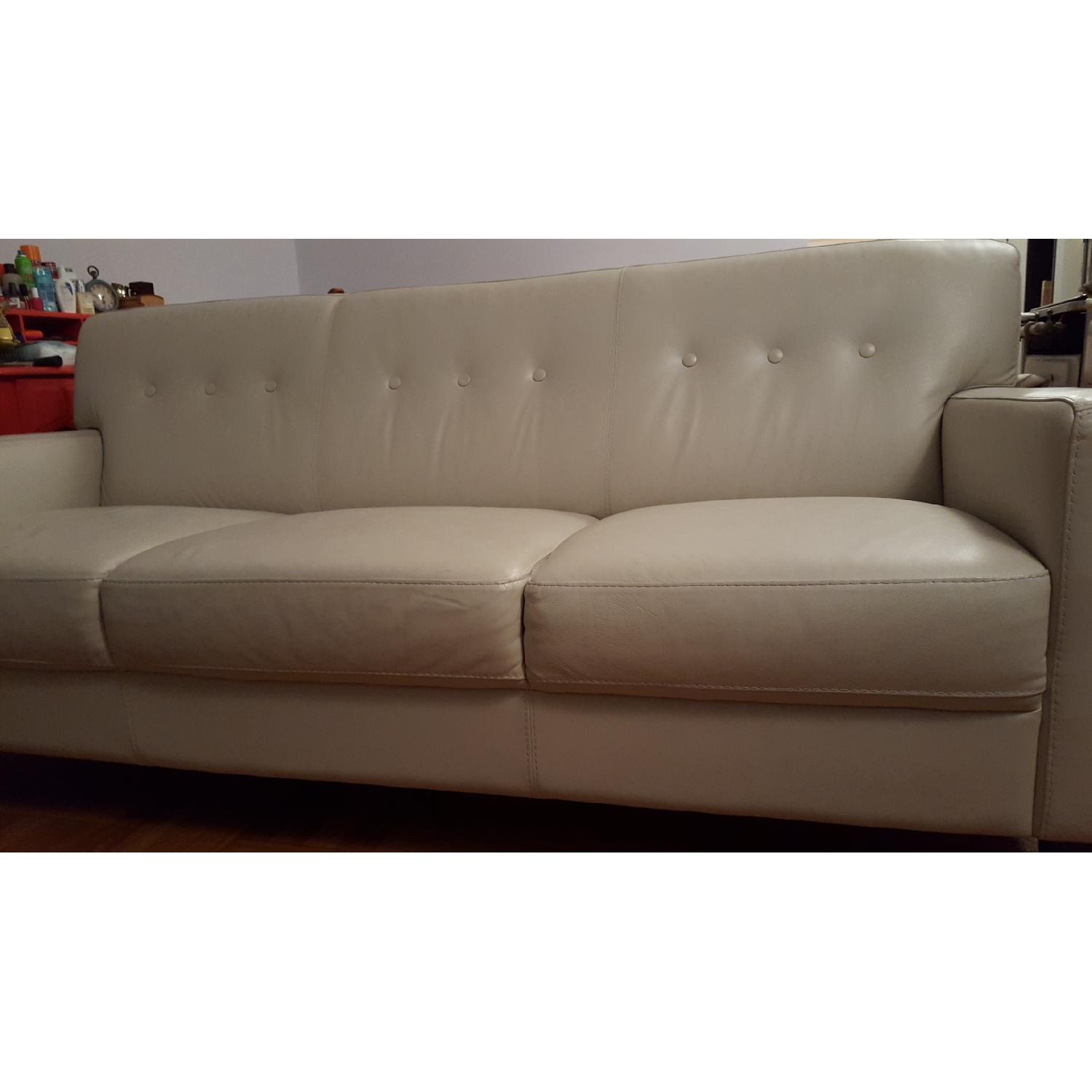chateau-d-ax-cream-leather-sofa-aptdeco