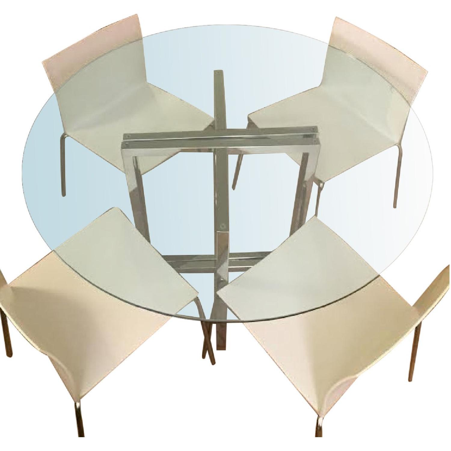 CB2 Silverado Chrome Round Dining Table w/ 4 Slim White Chairs - AptDeco