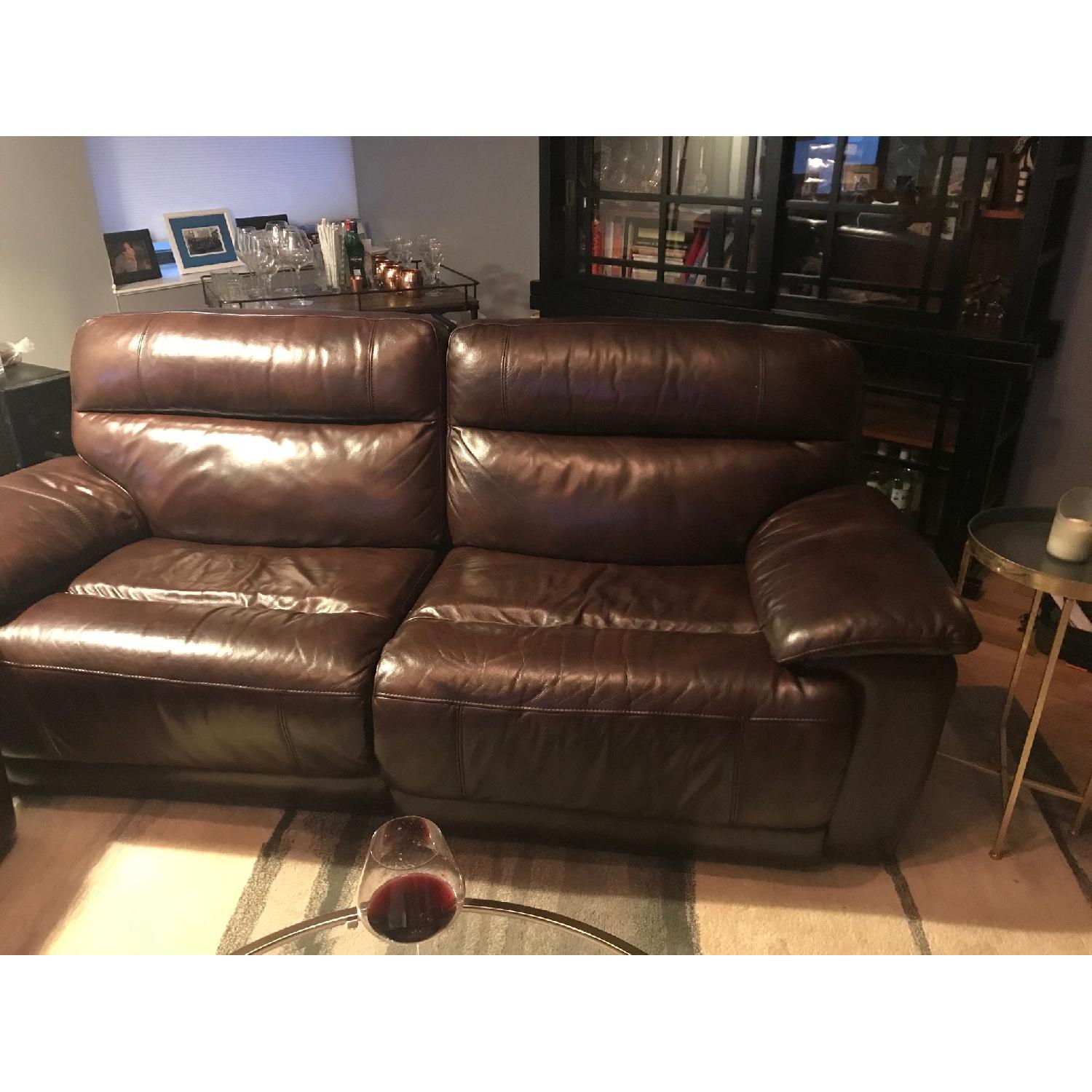 Raymour & Flanigan Brown Leather Reclining Sofa - image-1