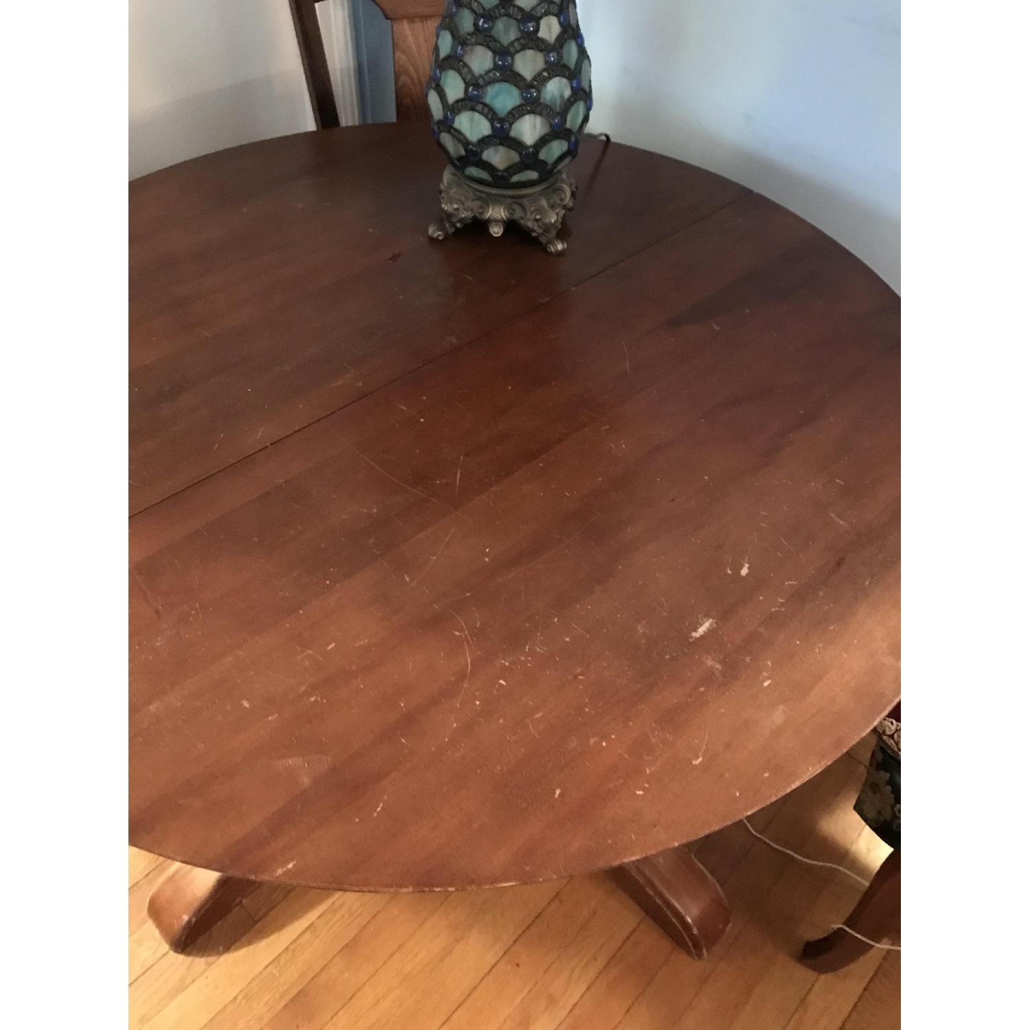 Pottery Barn Aris Pedestal Extendable Dining Table AptDeco