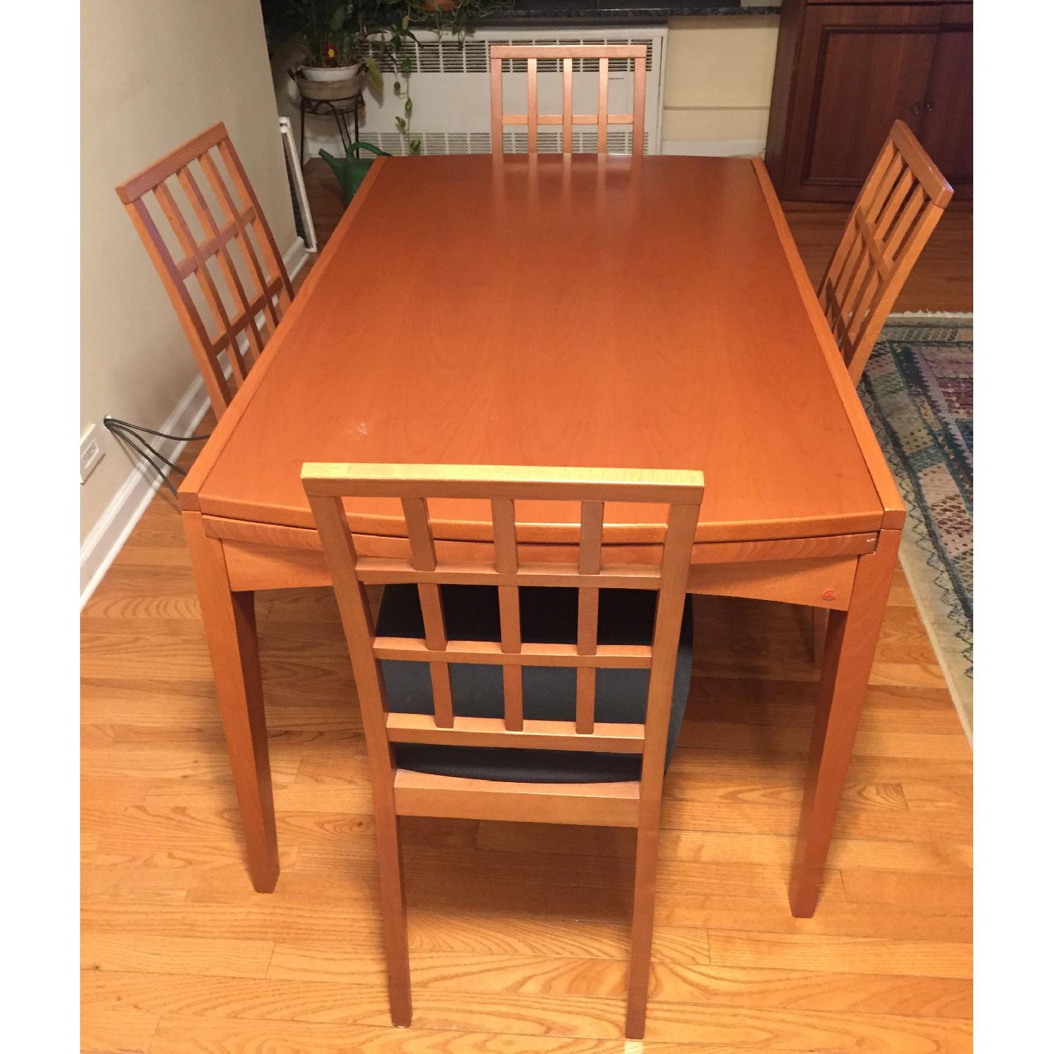 Jensen-Lewis Calligaris Extendable Dining Table w/ 4 Chairs - AptDeco