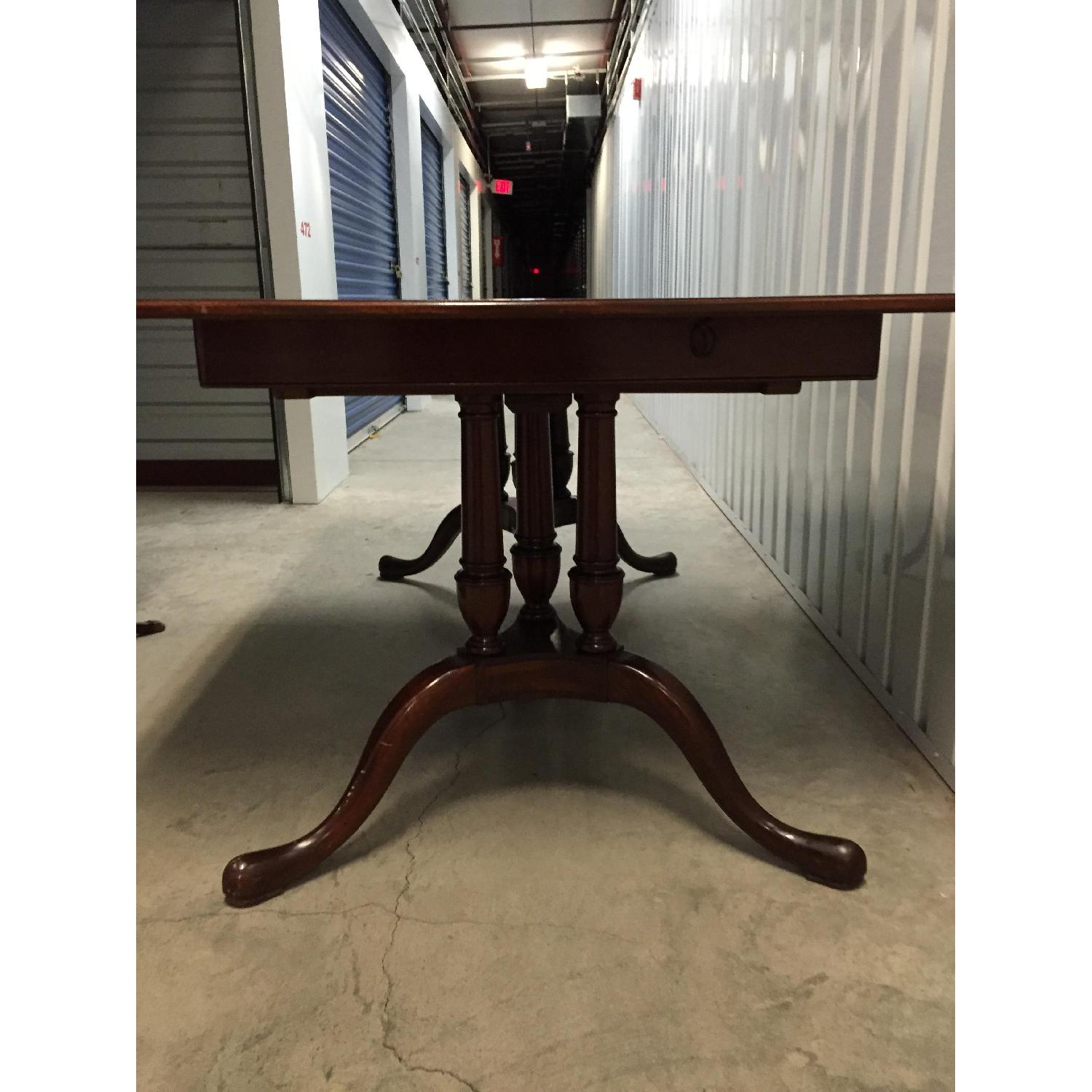 Vintage Large Extendable Dining Table w/ 7 Chairs - AptDeco