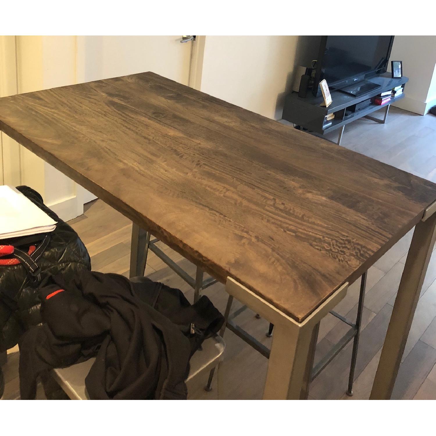 CB2 Stilt High Top Dining Table AptDeco