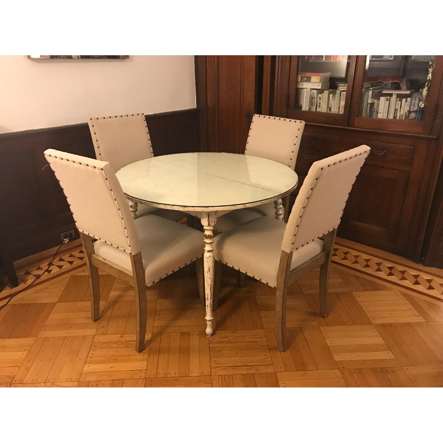 Round Dining Table w/ 4 Chairs - AptDeco