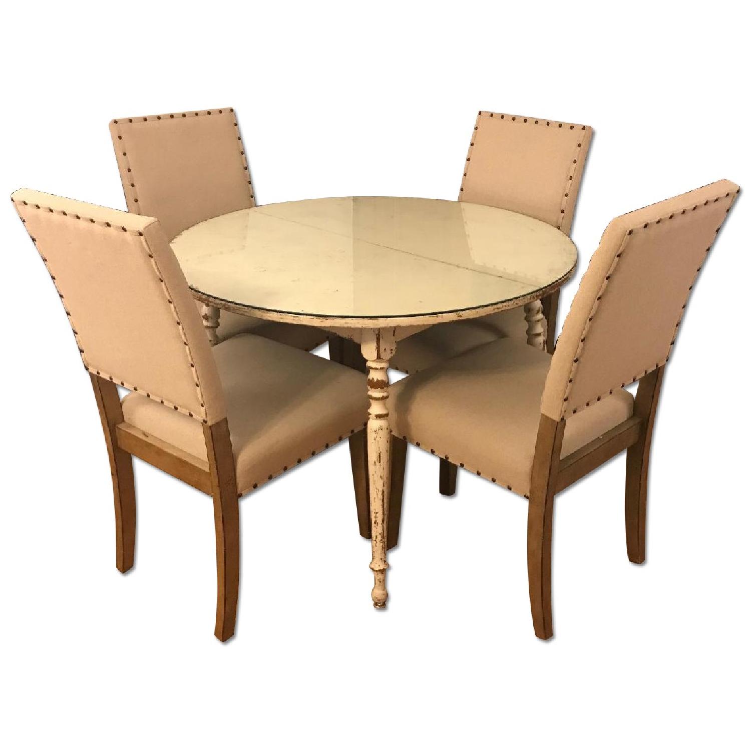 Round Dining Table w/ 4 Chairs - AptDeco