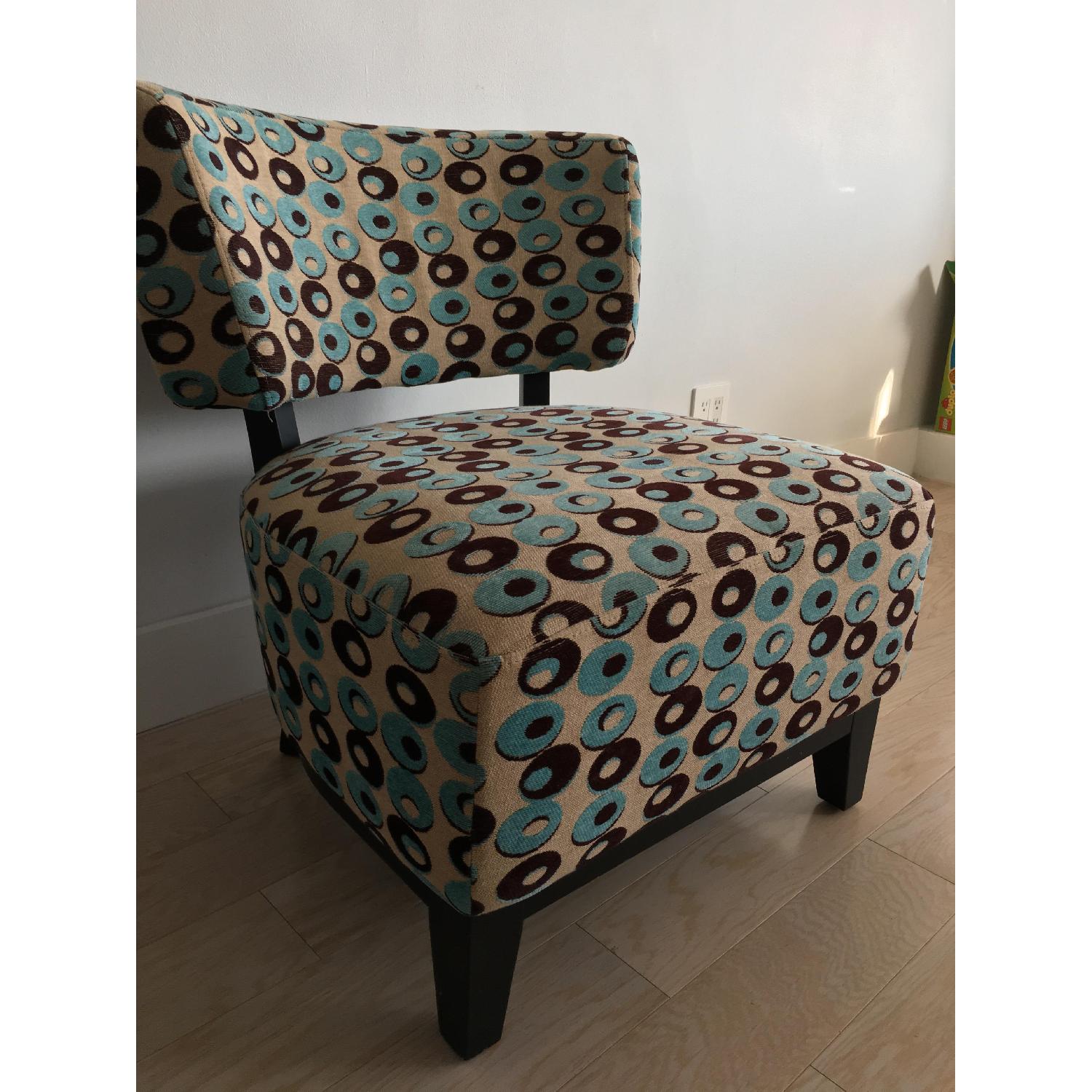 Curved Accent Chair in Upholstered Pattern - AptDeco
