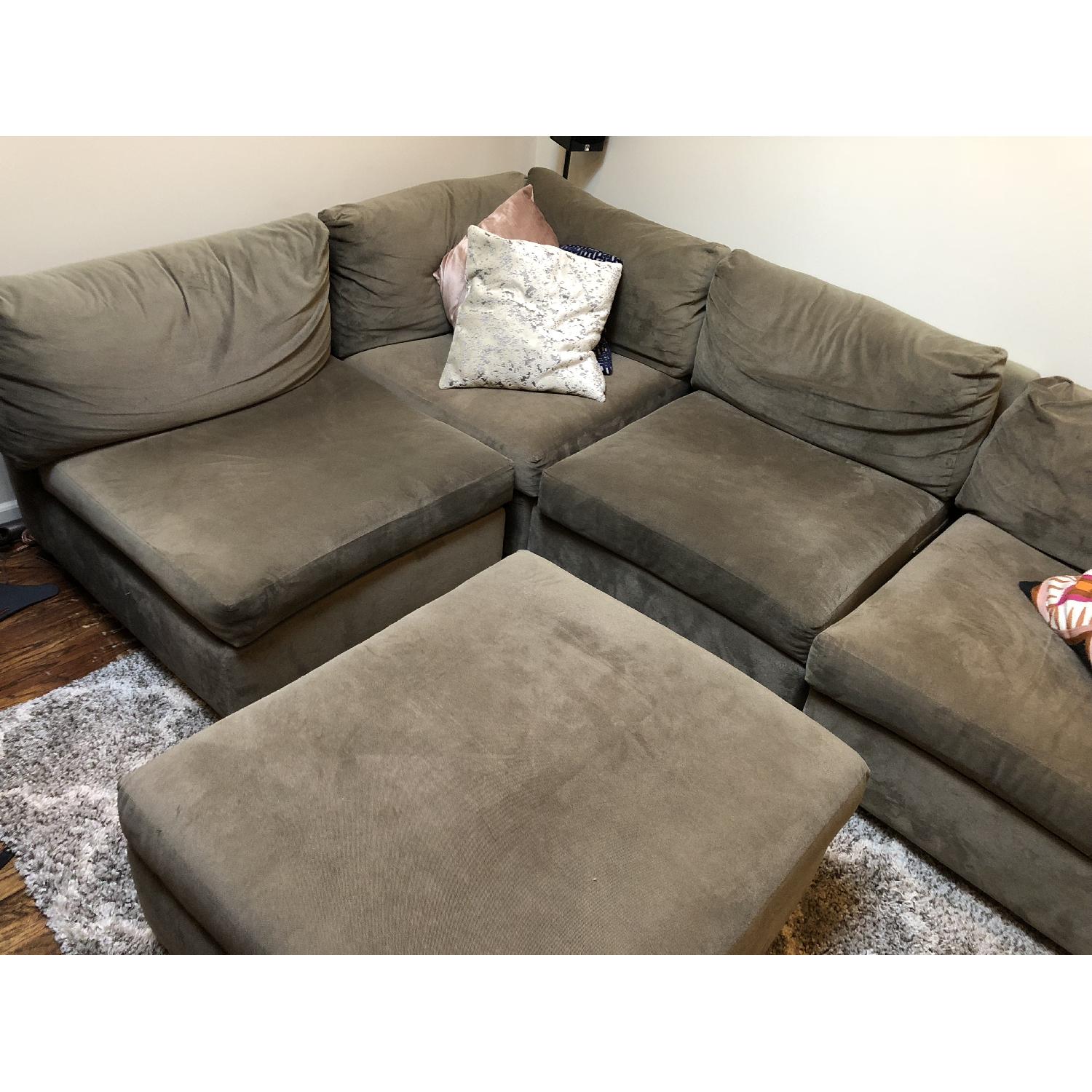 Raymour & Flanigan 3-Piece Sectional Sofa & Ottoman - AptDeco