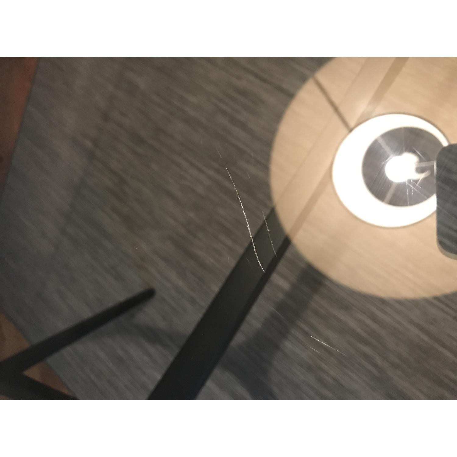 CB2 Glass Dining Table w/ Black Metal Base - image-4