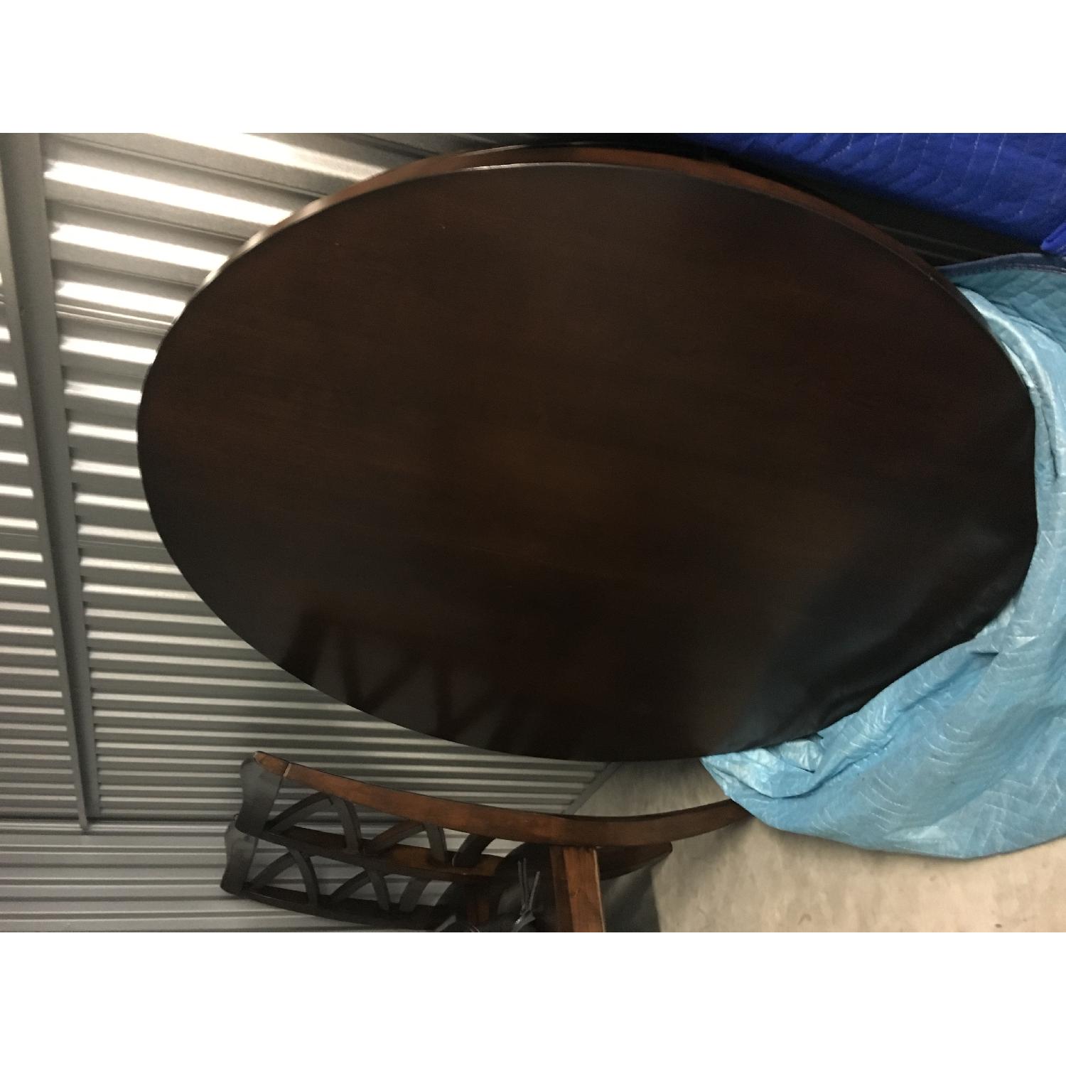 Ashley Round Expandable Dining Table w/ 4 Chairs - image-2