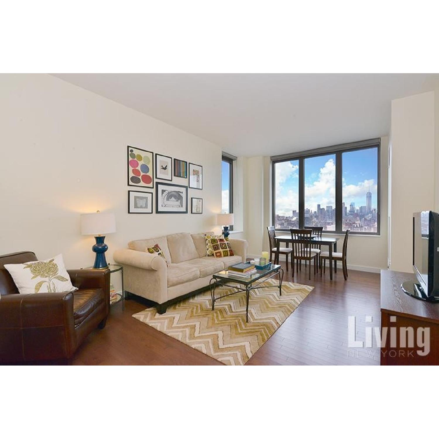 Boston Interiors Leather Chair & Ottoman - image-6