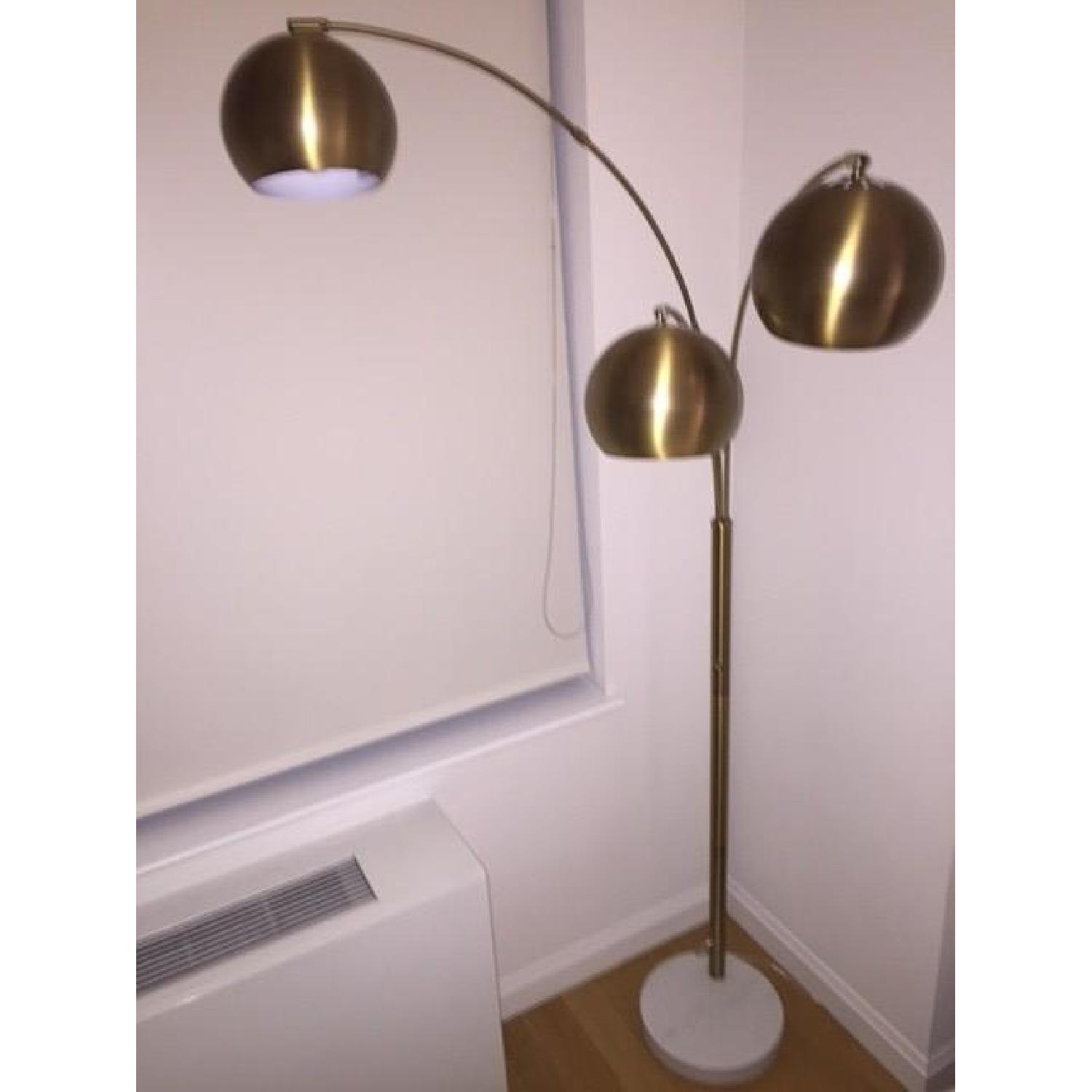 3 Globe Arc Floor Lamp in Antique Brass - image-2