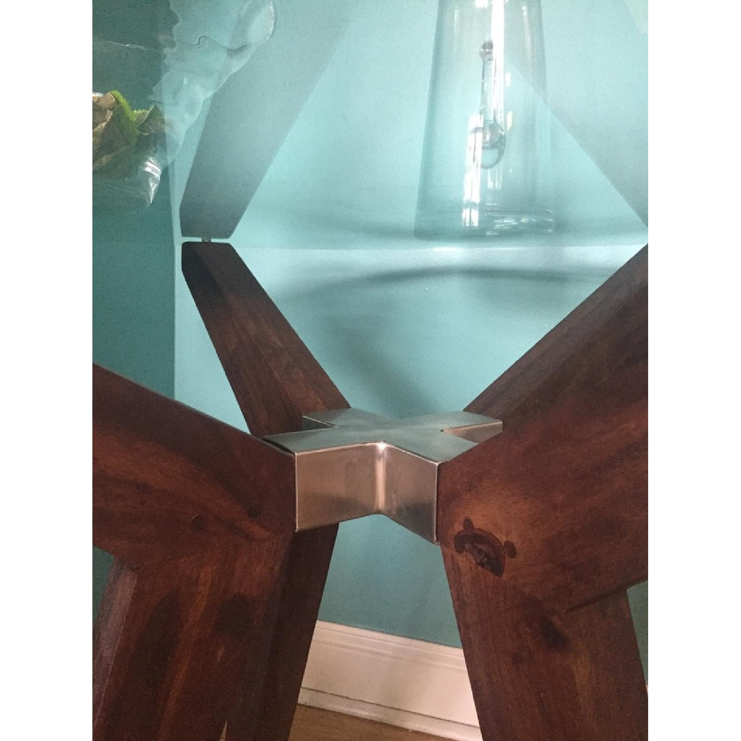 Crate & Barrel Strut Modern Round Glass Dining Table AptDeco