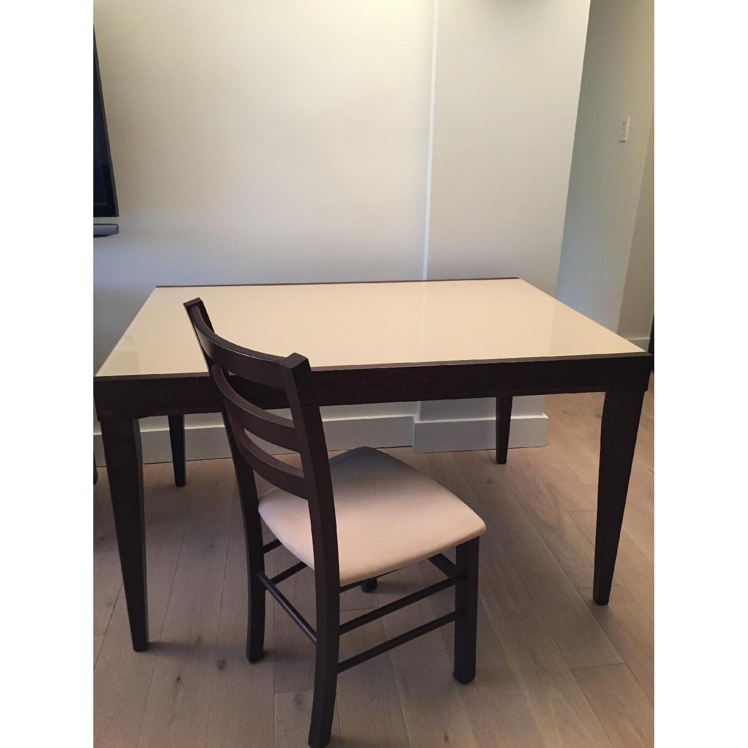 Macy's Cafe Latte Glass Top Extendable Dining Table w/ 6 Chairs AptDeco