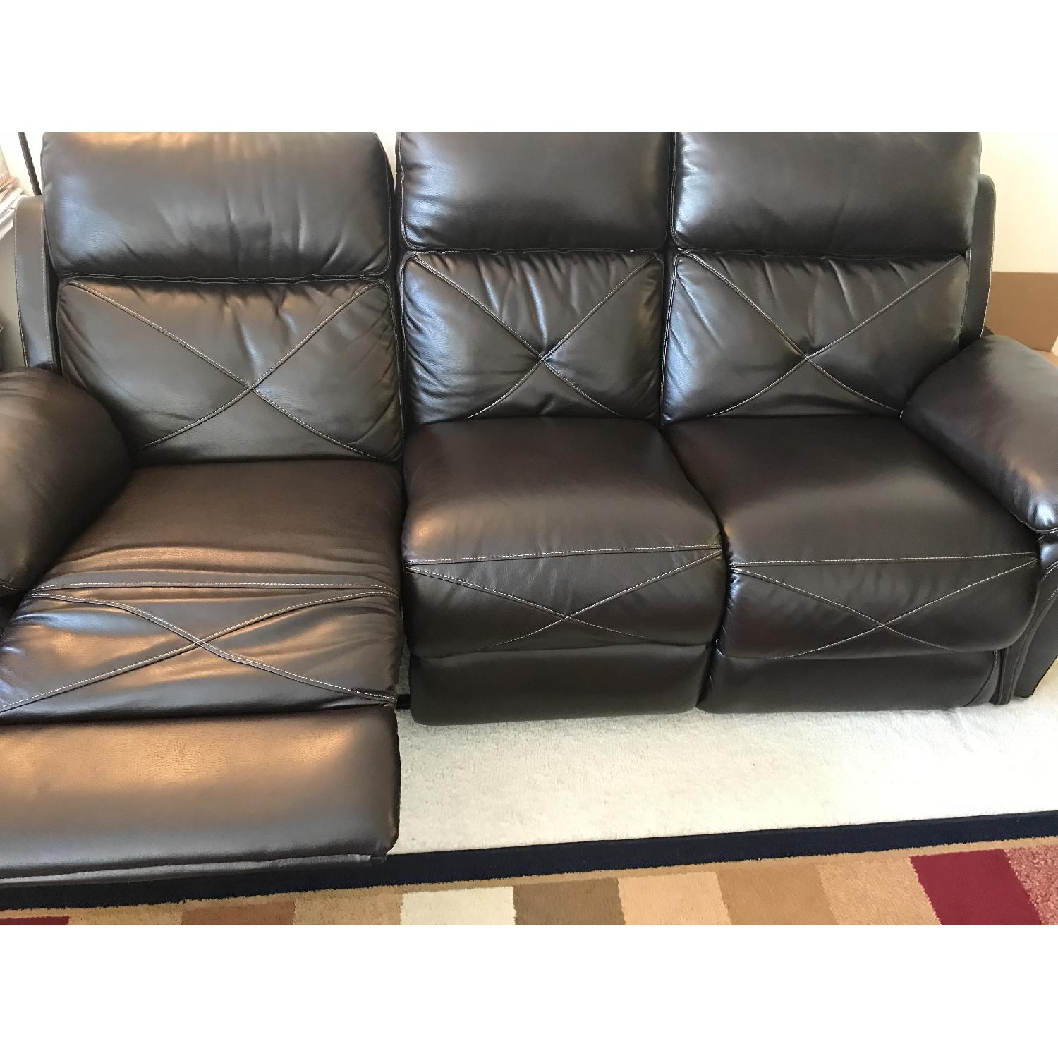 Bob's Brown Faux Leather Reclining Sofa AptDeco