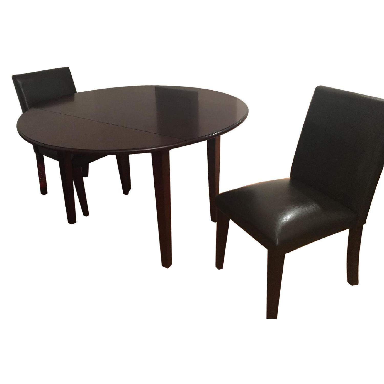 Macy's Round Expandable Dining Table w/ 2 Chairs AptDeco
