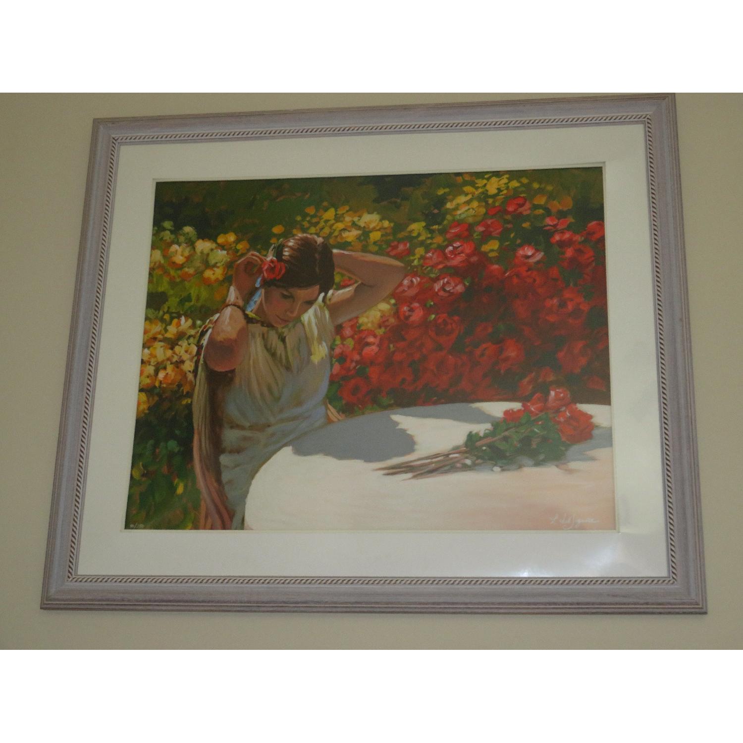 Framed Print of Woman Placing Rose in Her Hair - image-1