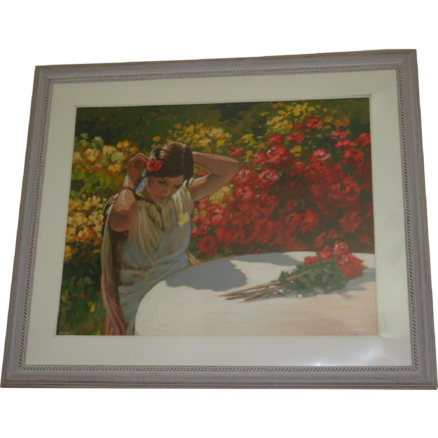Framed Print of Woman Placing Rose in Her Hair - image-0