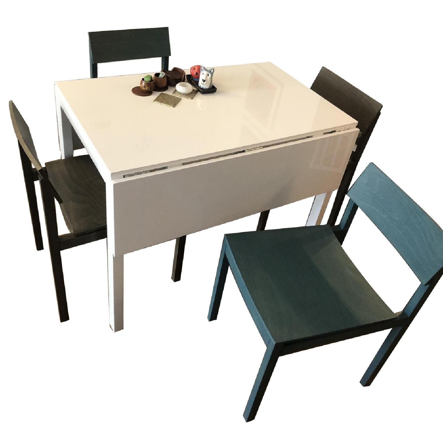 CB2 White Extendable Dining Table w/ 4 Chairs - image-0