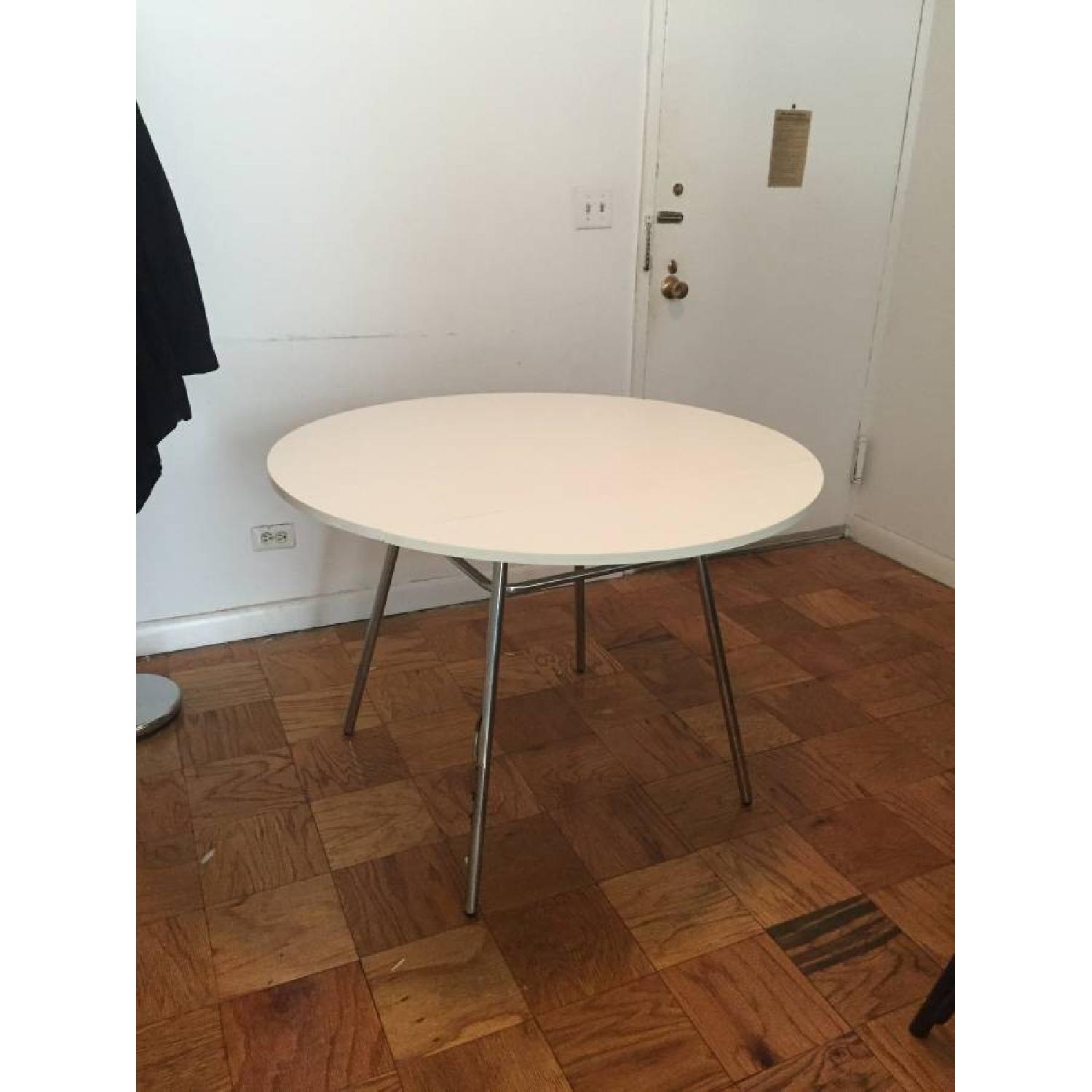 Crate & Barrel White Round Drop Leaf Table - image-1
