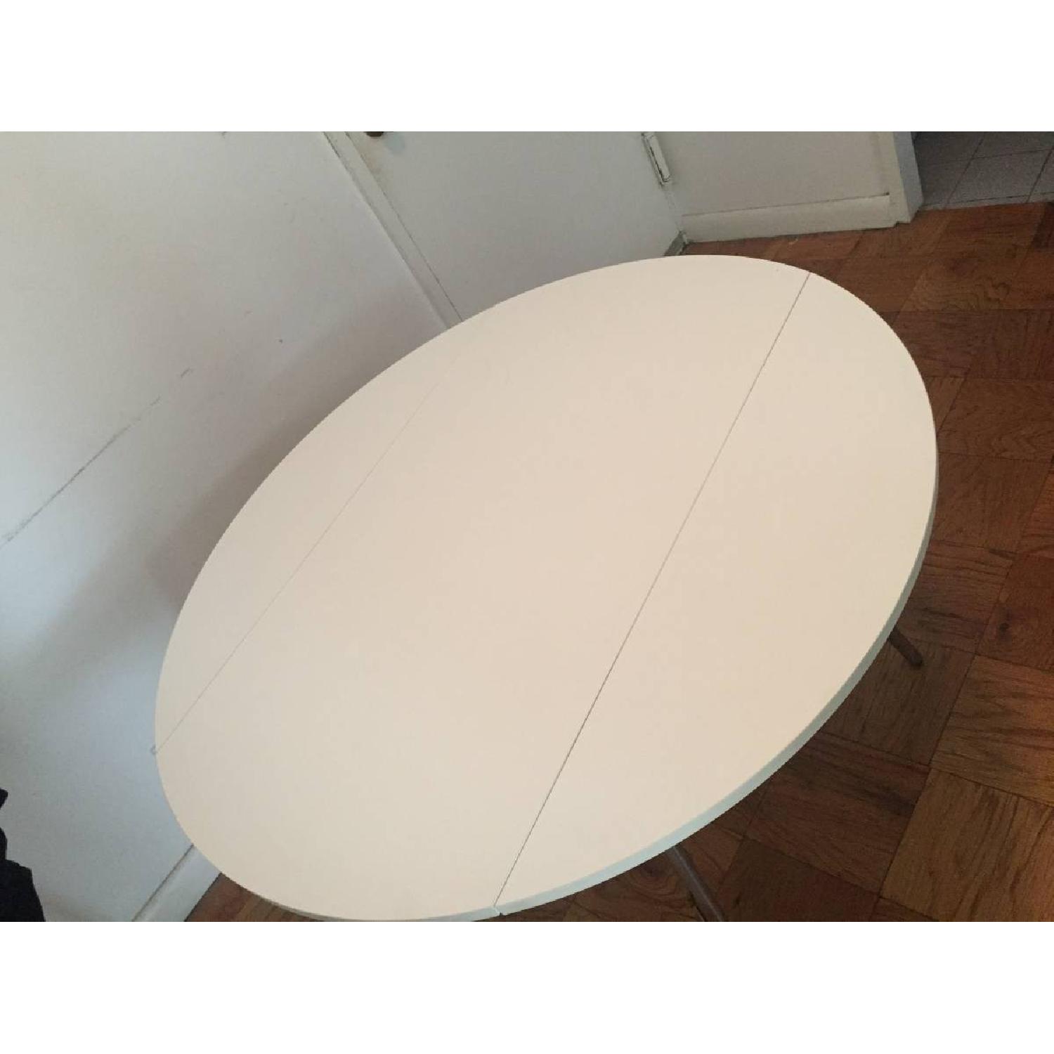 Crate & Barrel White Round Drop Leaf Table - image-3