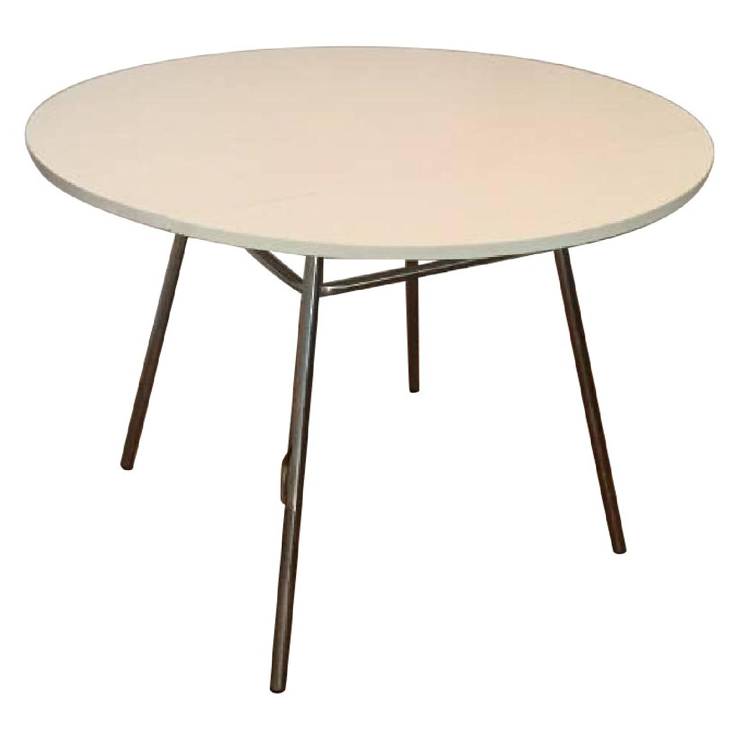 Crate & Barrel White Round Drop Leaf Table AptDeco